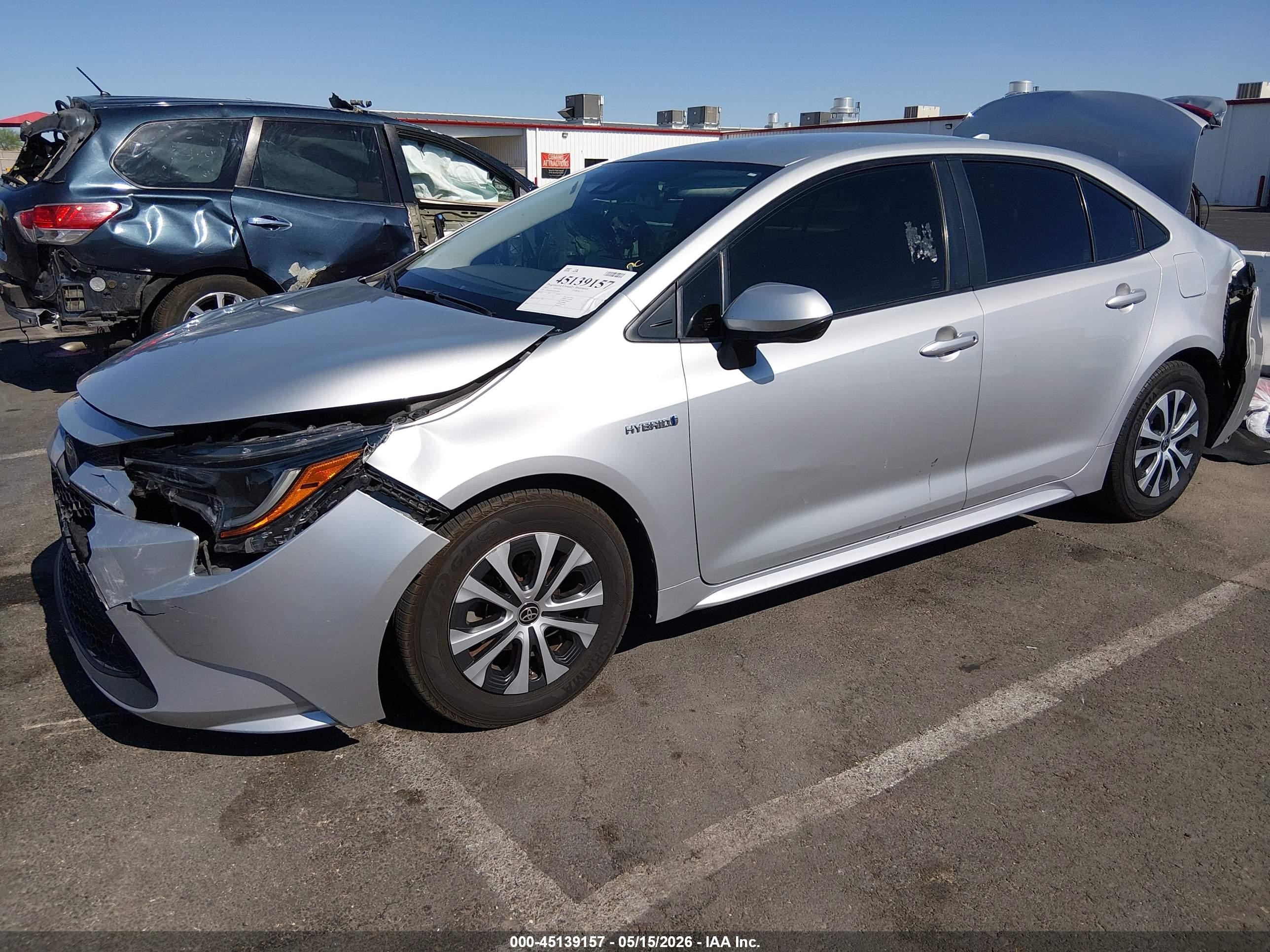 2021 Toyota Corolla Hybrid Le Silver vin: JTDEAMDE8MJ014096