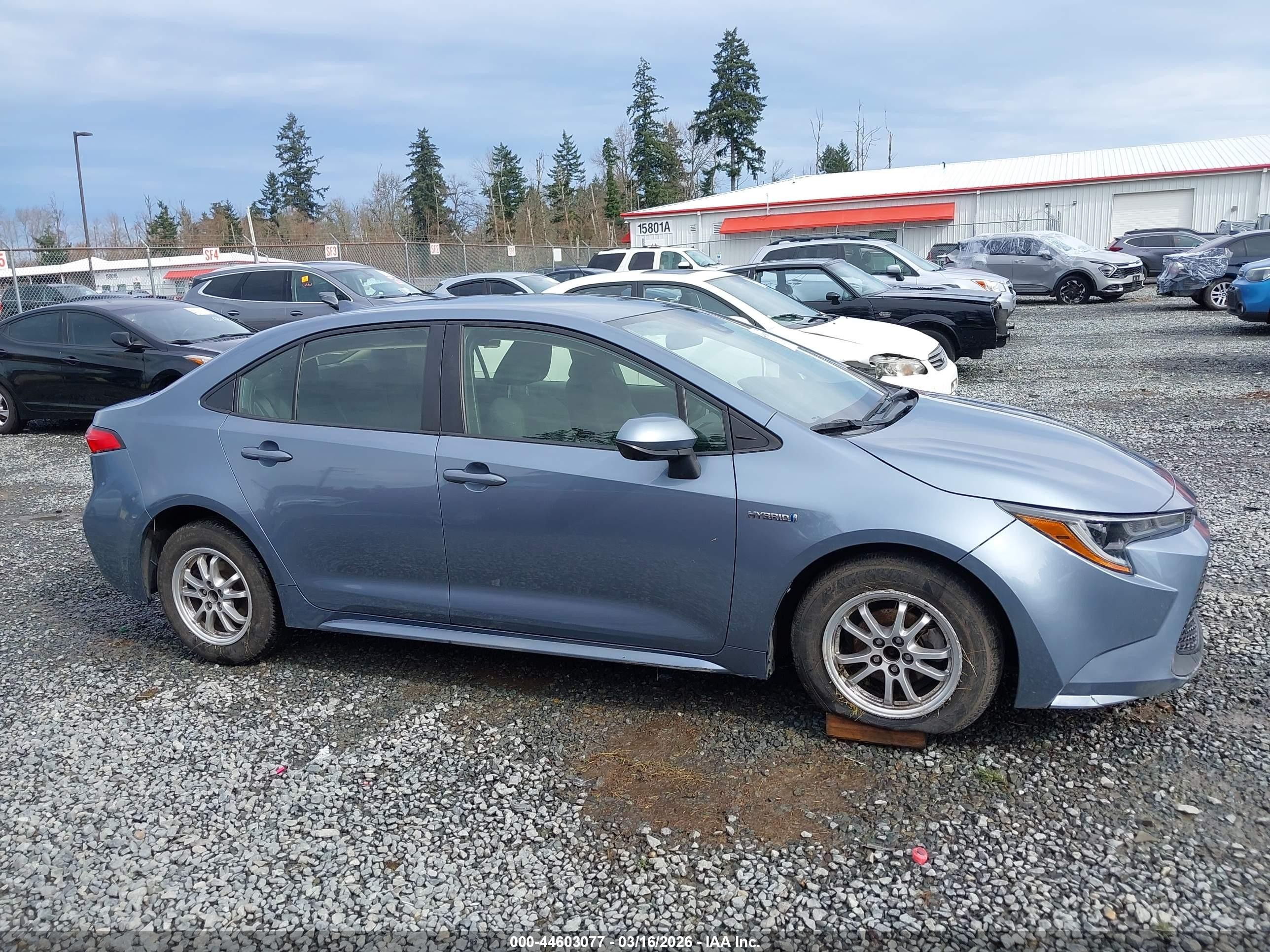 2021 Toyota Corolla Hybrid Le Light Blue vin: JTDEAMDE9MJ009165