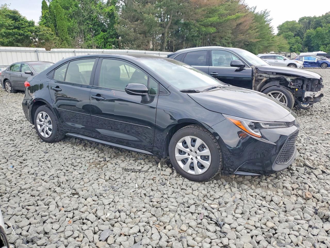 2022 Toyota Corolla Le Black vin: JTDEPMAE4NJ201954