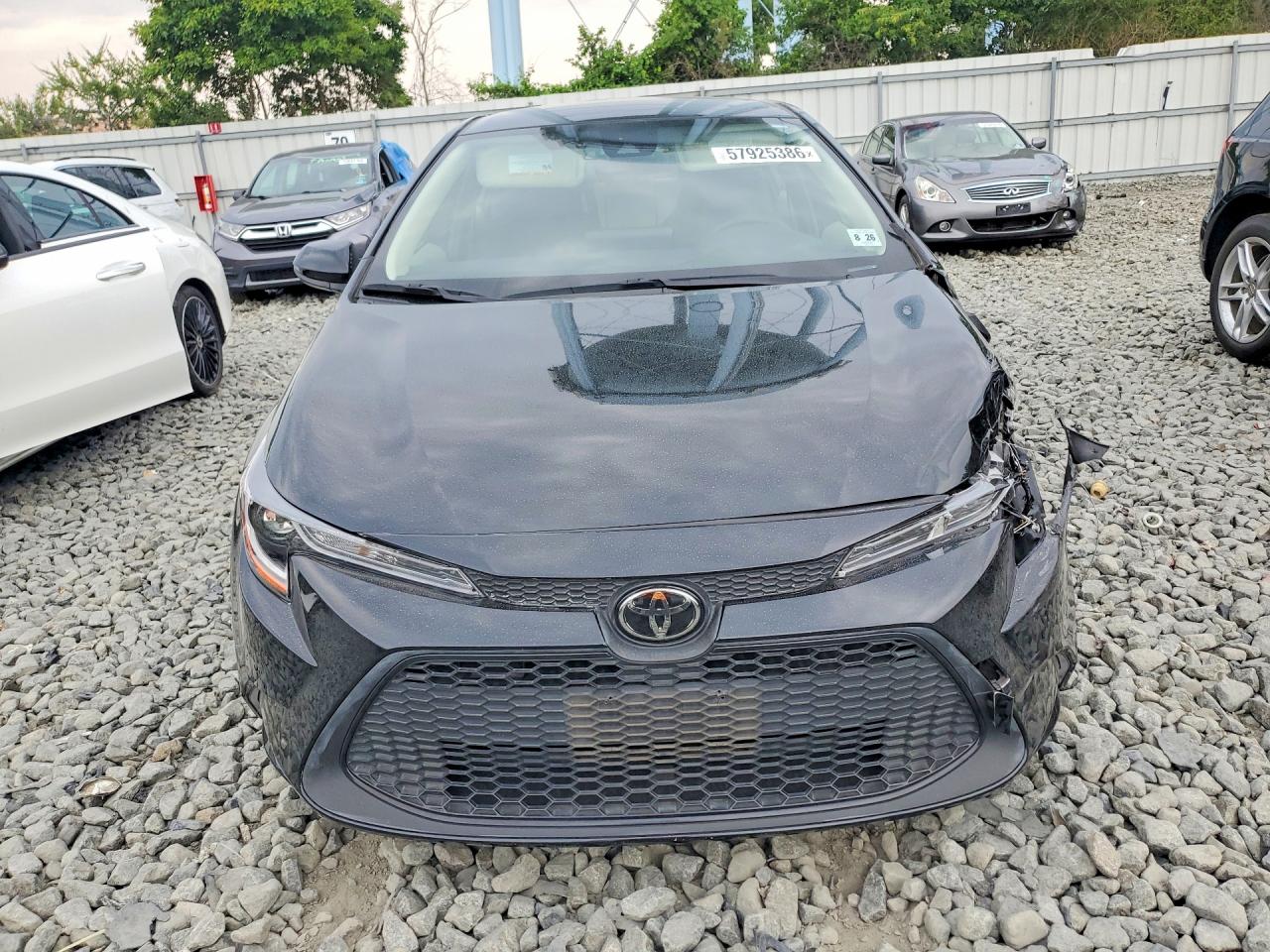 2022 Toyota Corolla Le Black vin: JTDEPMAE4NJ201954