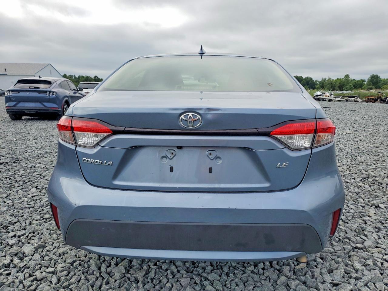 2021 Toyota Corolla Le Blue vin: JTDEPMAE9MJ129051