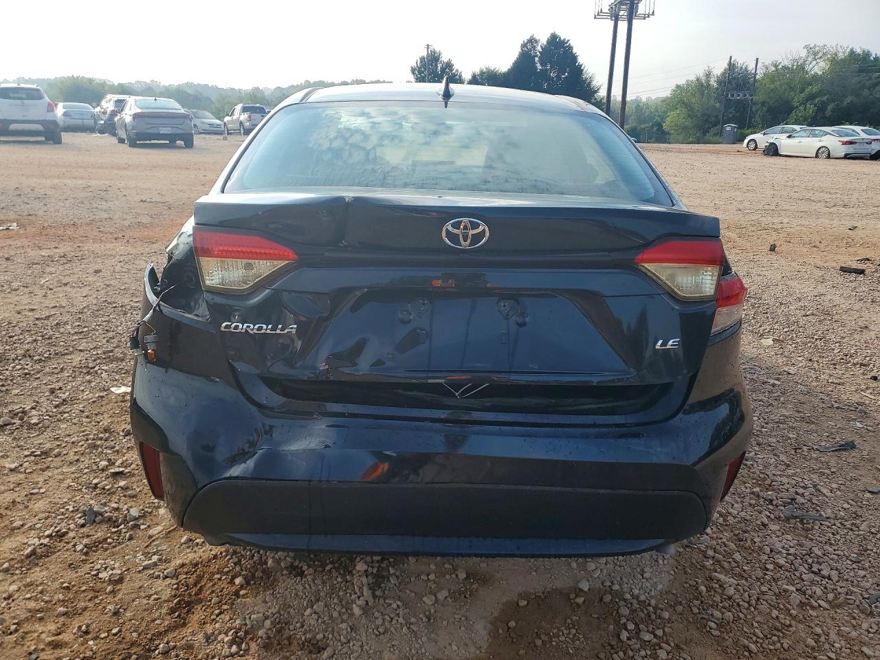 2021 Toyota Corolla Le Black vin: JTDEPMAEXMJ177397