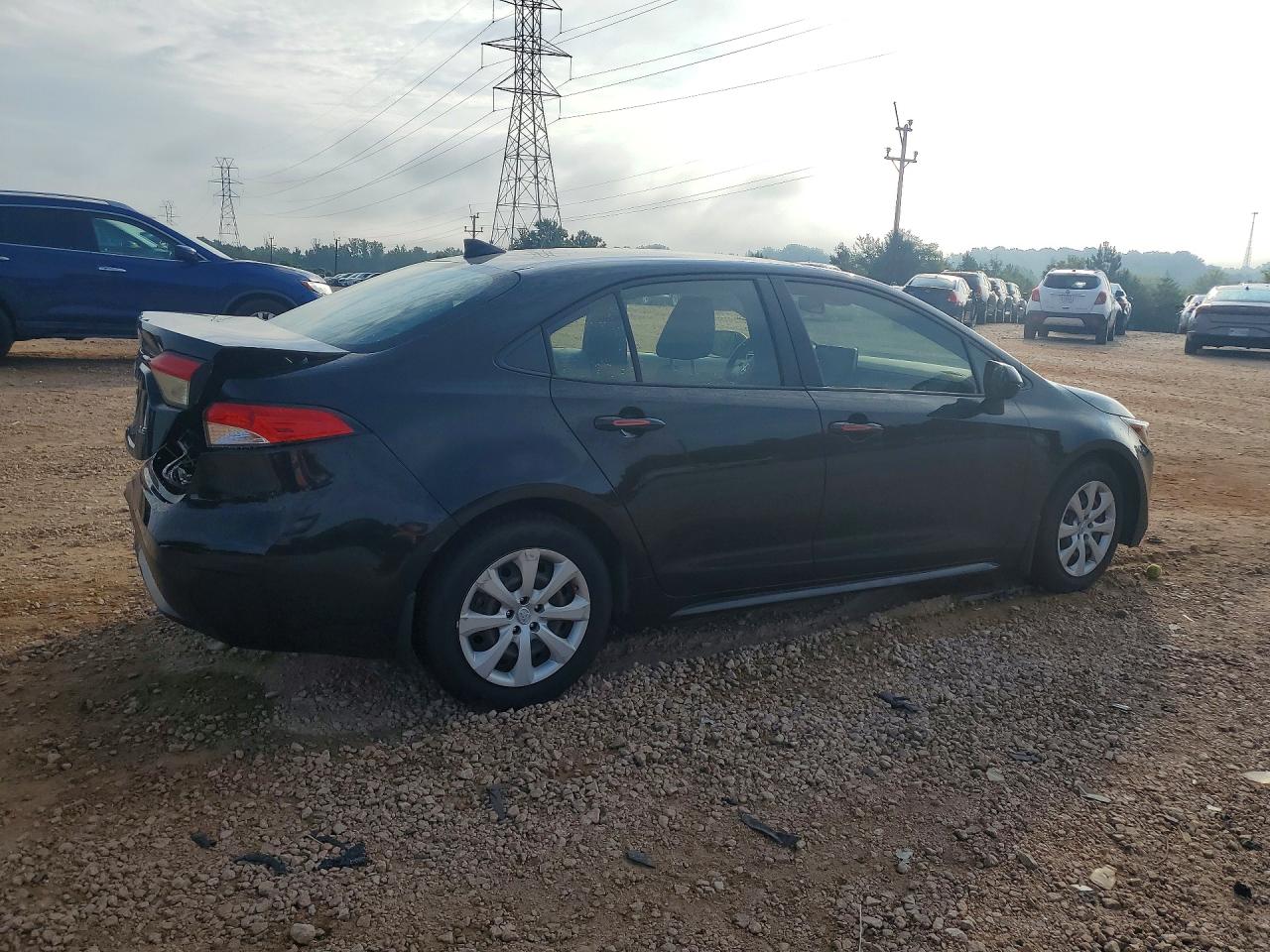 2021 Toyota Corolla Le Black vin: JTDEPMAEXMJ177397
