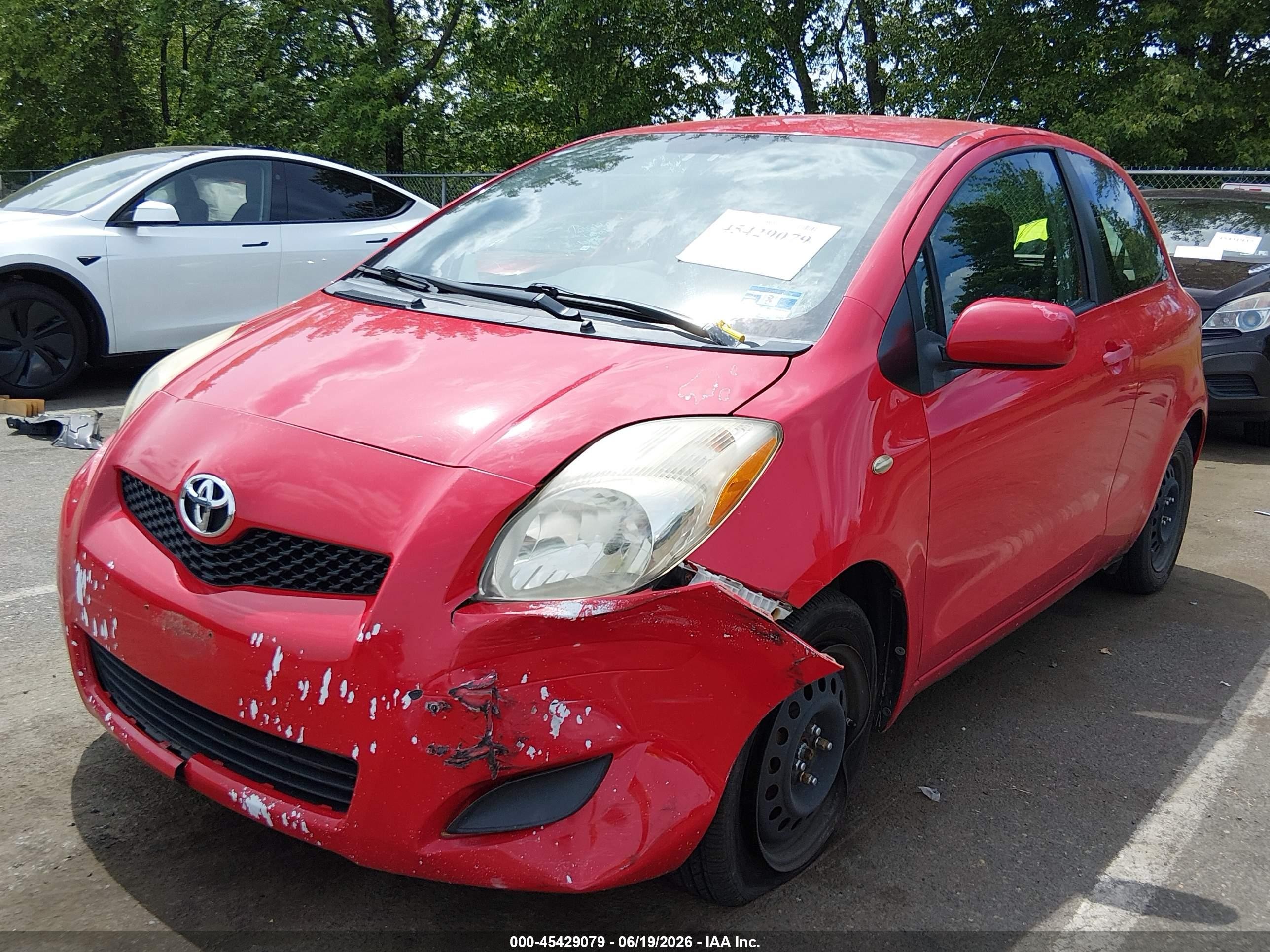 2010 Toyota Yaris   Red vin: JTDJT4K31A5319342