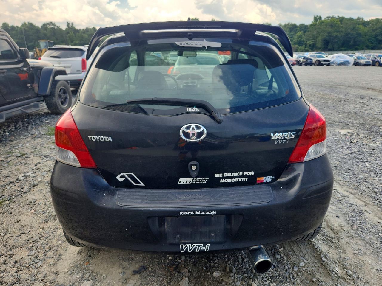 2010 Toyota Yaris Base Black vin: JTDJT4K37A5285388