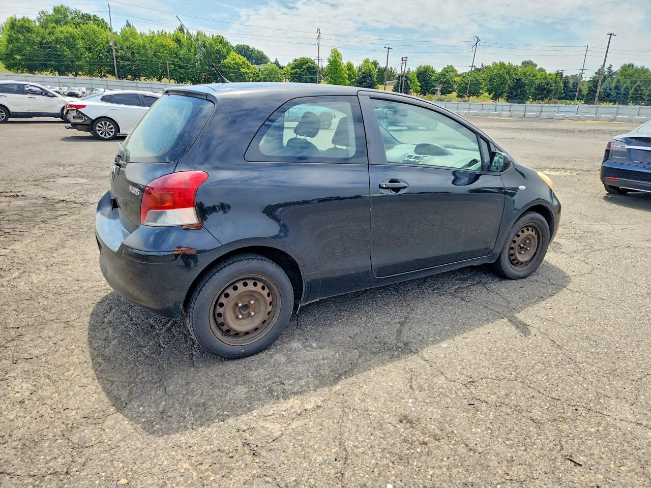 2011 Toyota Yaris Base Black vin: JTDJT4K38B5334132