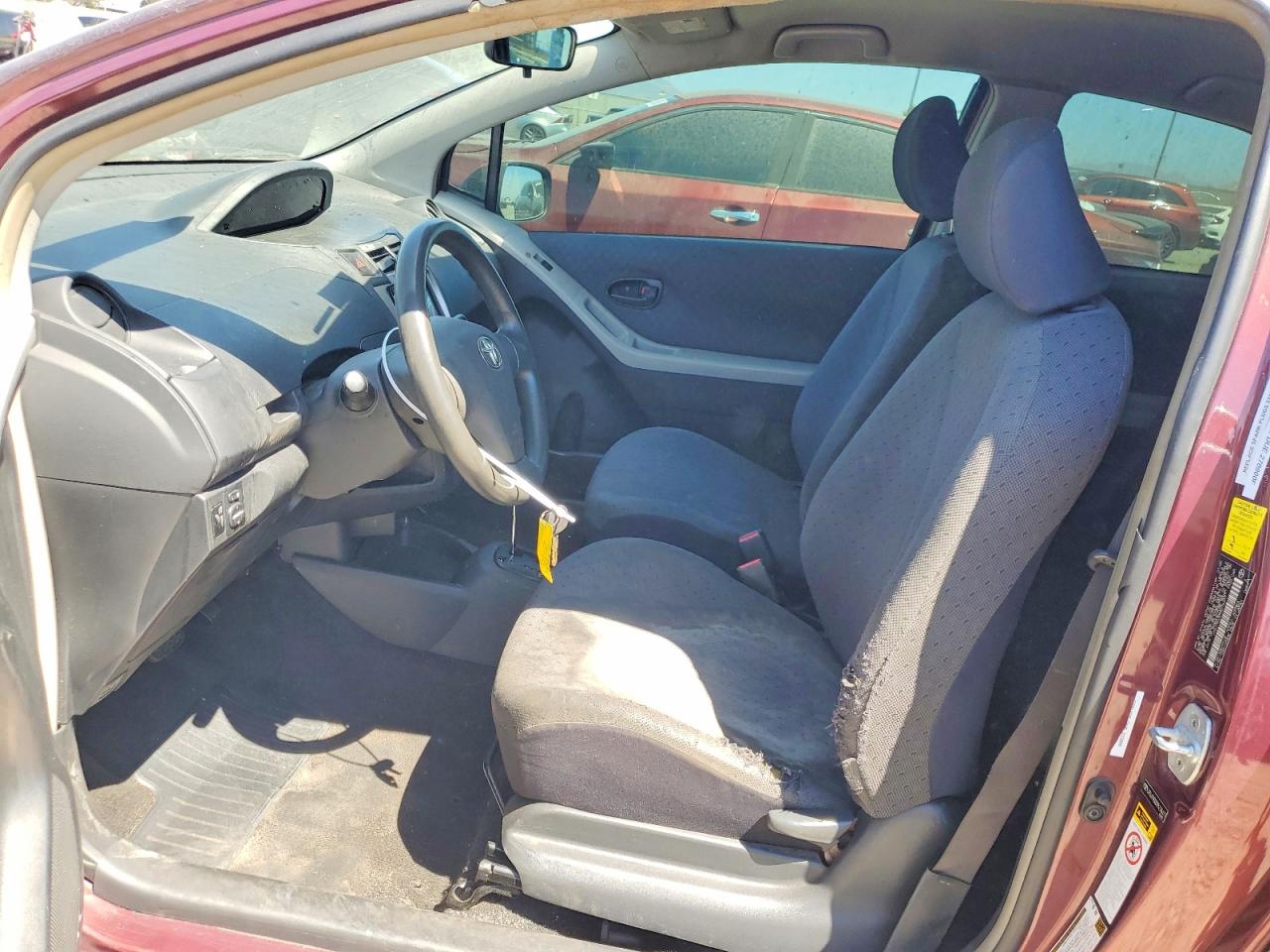 2009 Toyota Yaris Base Burgundy vin: JTDJT903095276477