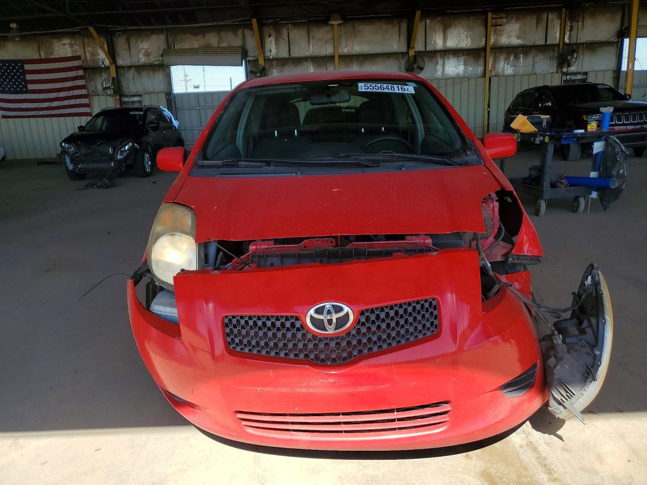 2008 Toyota Yaris Base Red vin: JTDJT903585216192