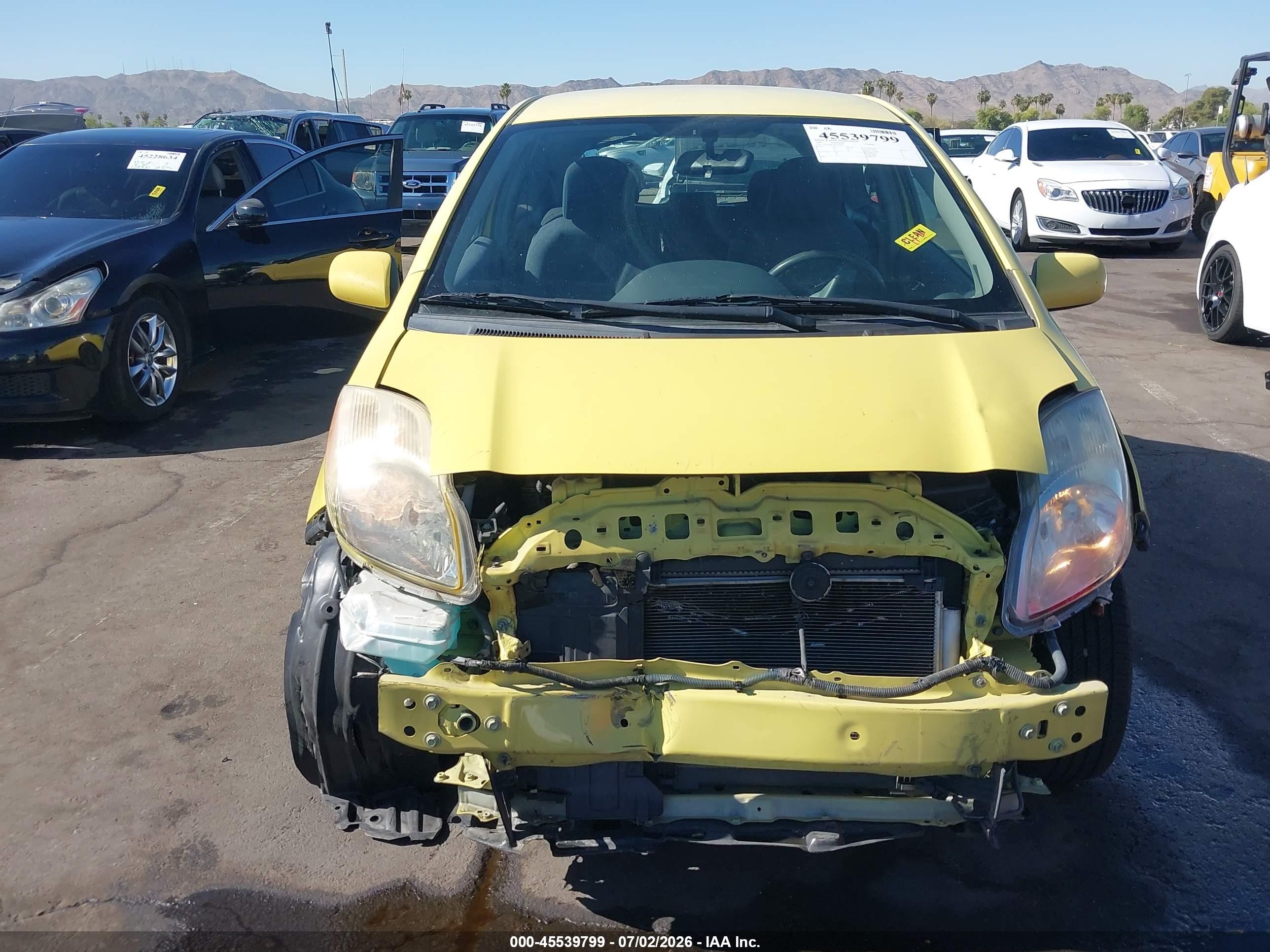 2009 Toyota Yaris   Желтый vin: JTDJT903595239392