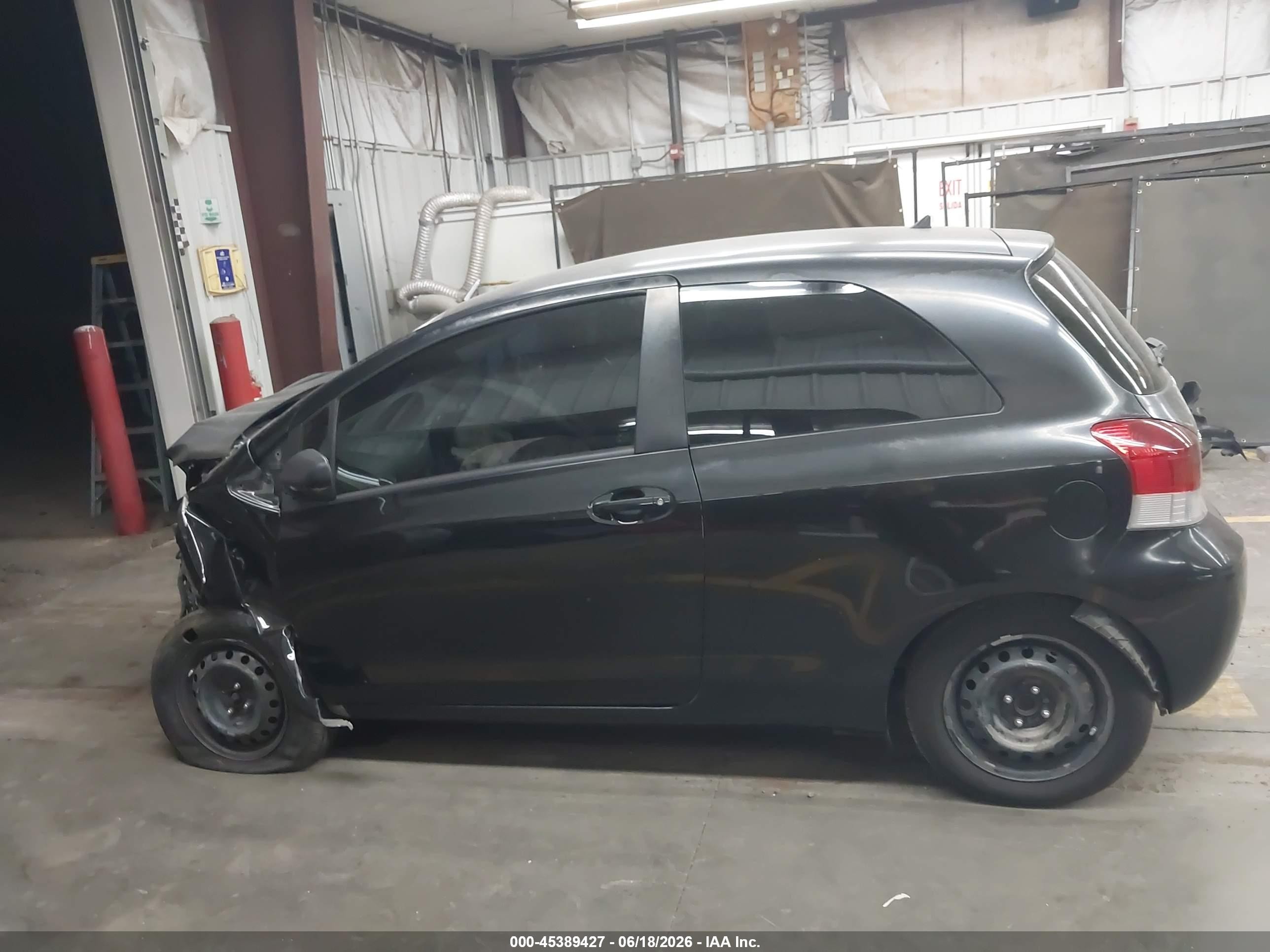 2009 Toyota Yaris   Black vin: JTDJT903695252121