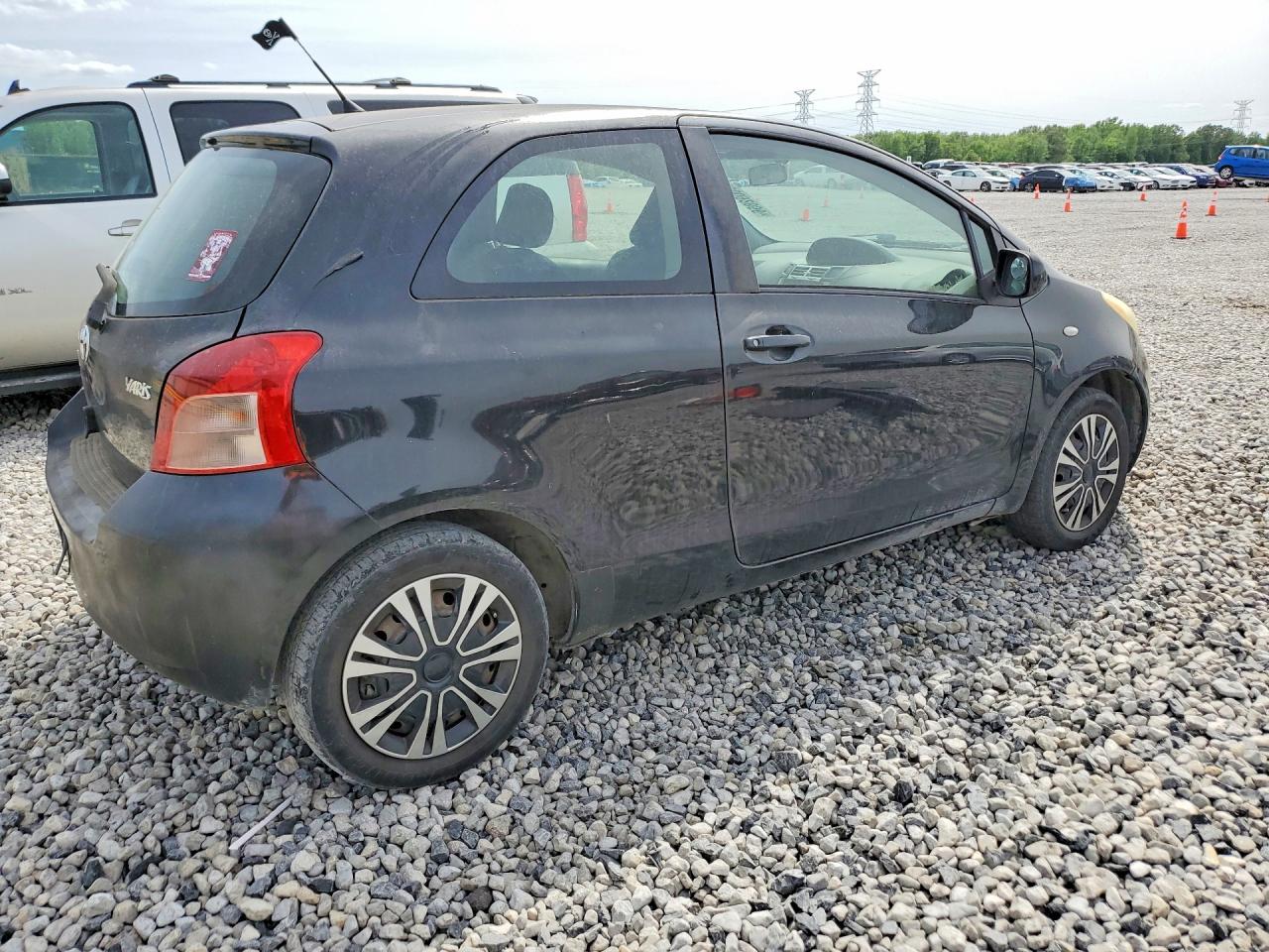 2008 Toyota Yaris Base Black vin: JTDJT903785162829
