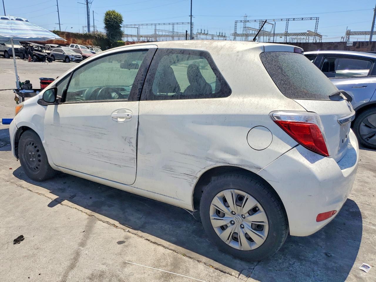 2012 Toyota Yaris 3-door Le White vin: JTDJTUD37CD507014