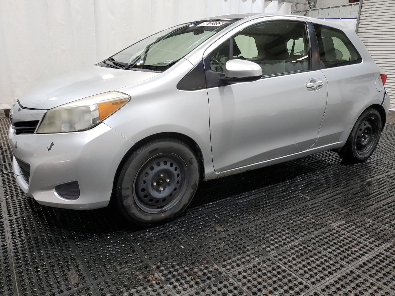 2013 Toyota Yaris Silver vin: JTDJTUD37DD549474 Damage: Left Front Wheel Cover, Missing, Replacement Required