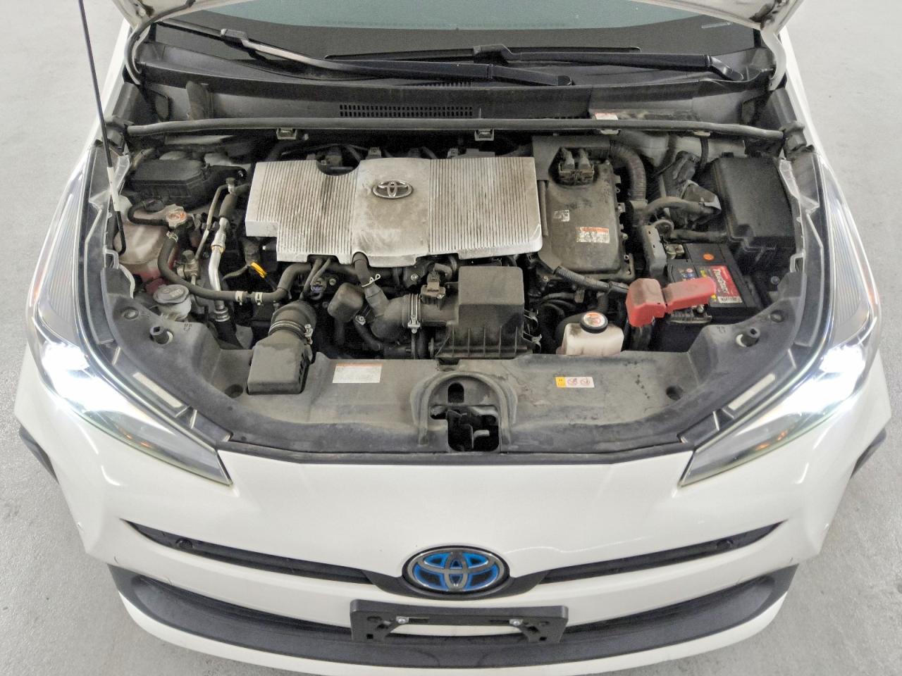 2021 Toyota Prius Le White vin: JTDKAMFU5M3148396
