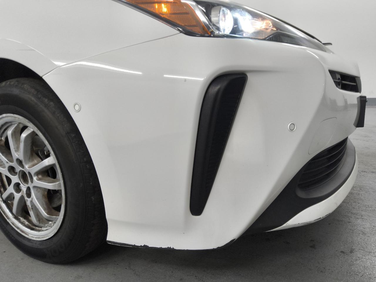 2021 Toyota Prius Le White vin: JTDKAMFU5M3148396 Damage: Front Bumper, Heavy Scratch, > 12 Inches