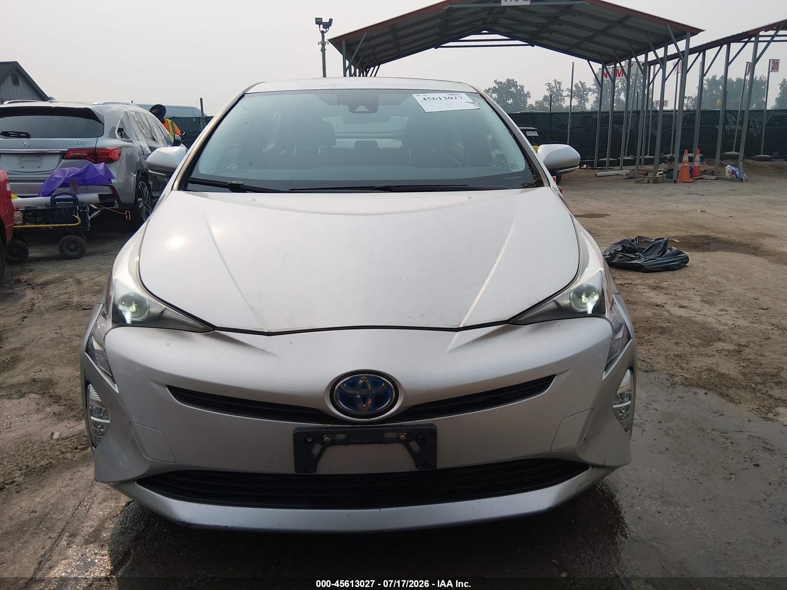 2016 Toyota Prius Three Touring Серебряный vin: JTDKARFU0G3515352