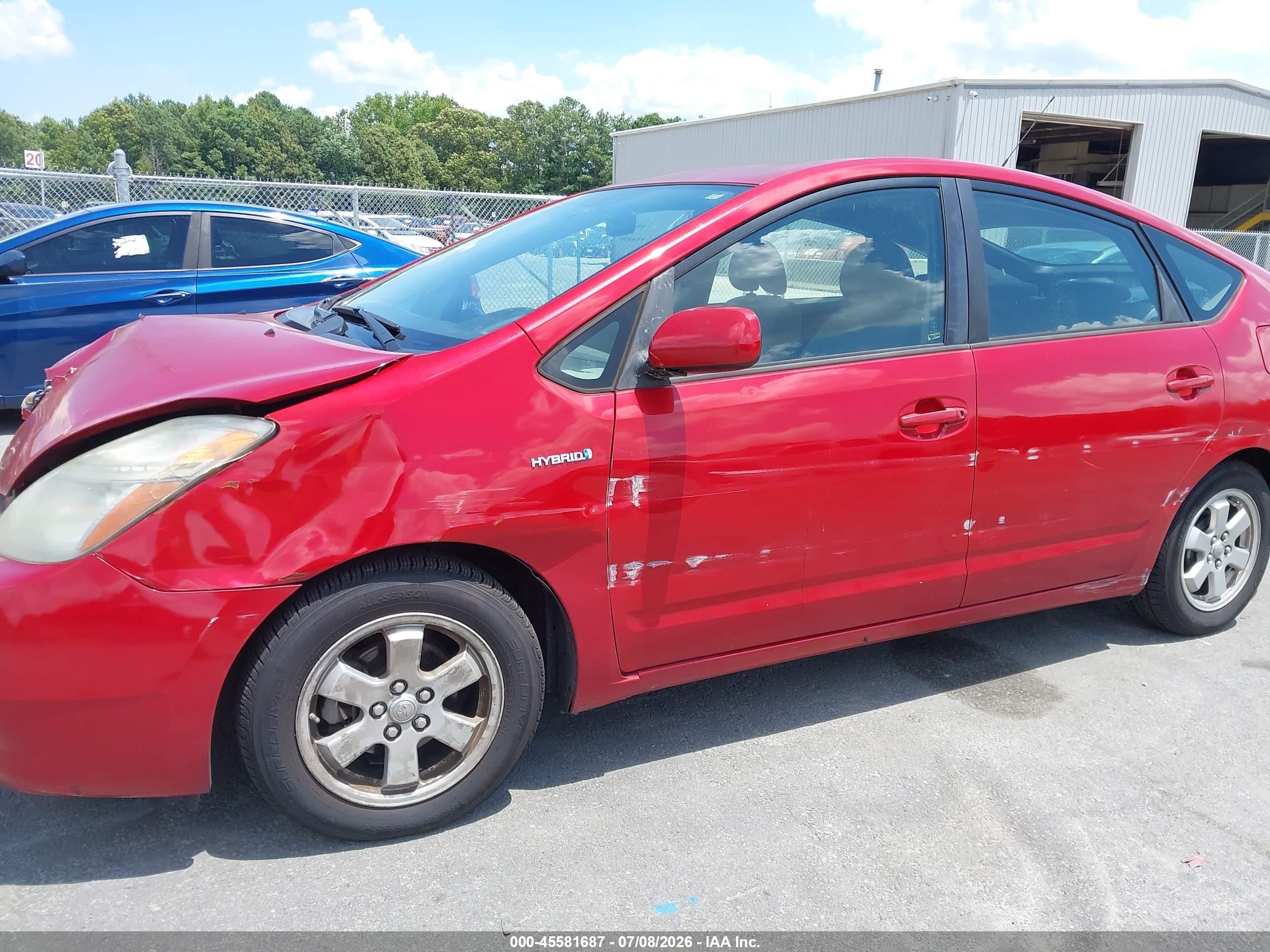 2006 Toyota Prius   Red vin: JTDKB20U067067425