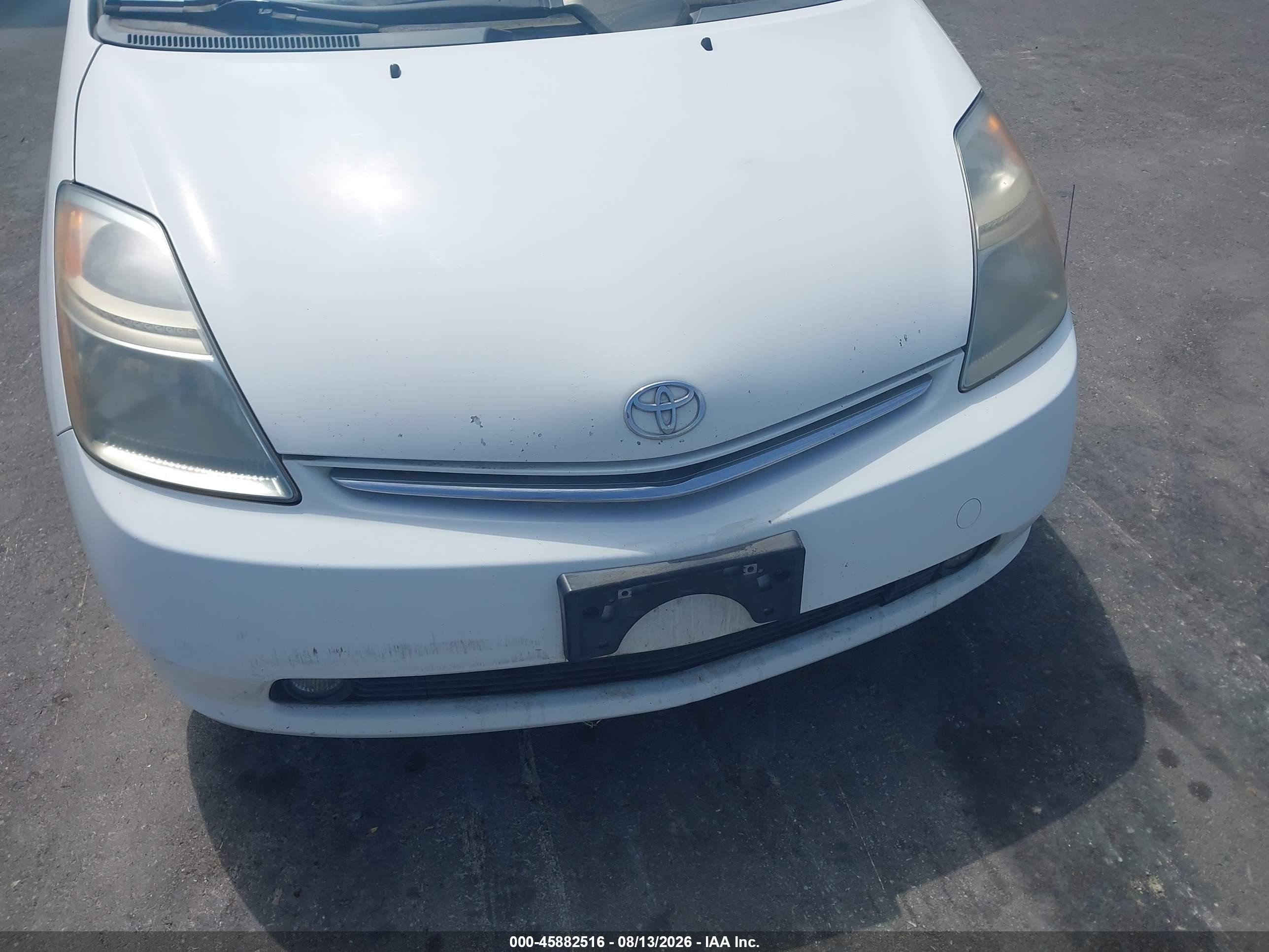 2009 Toyota Prius   White vin: JTDKB20U093464189