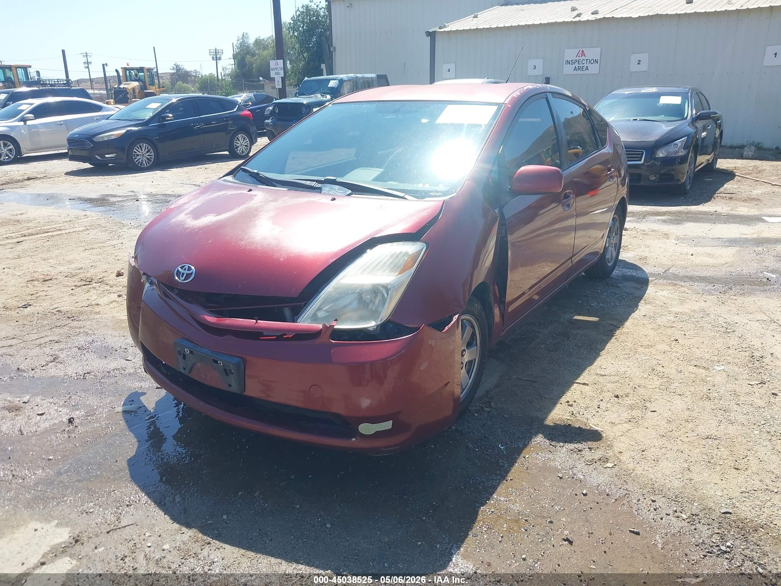 2005 Toyota Prius   Red vin: JTDKB20U157019060