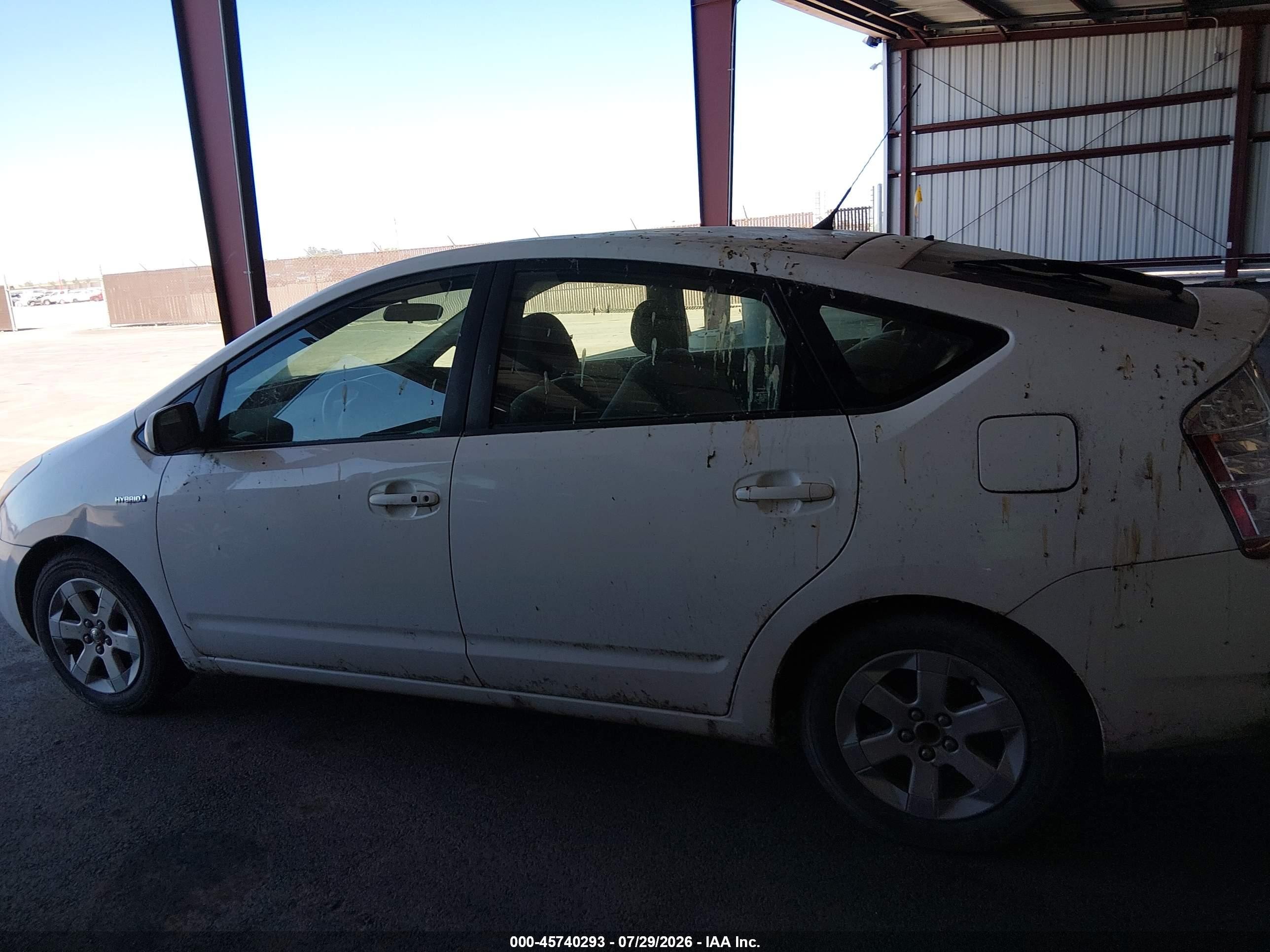 2007 Toyota Prius   Белый vin: JTDKB20U377656194