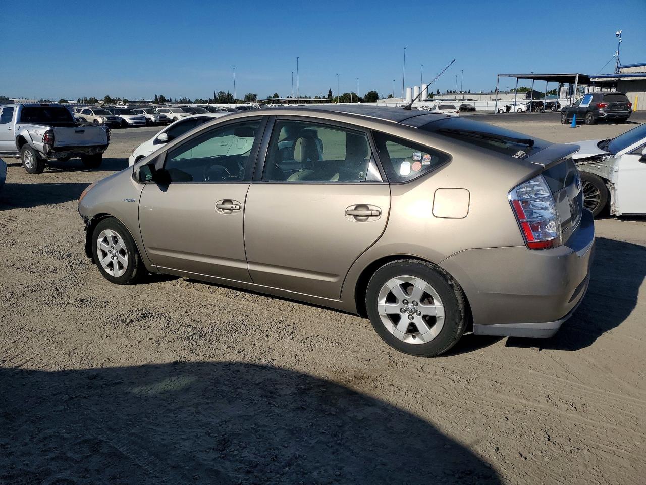 2007 Toyota Prius Base Gold vin: JTDKB20U477610258