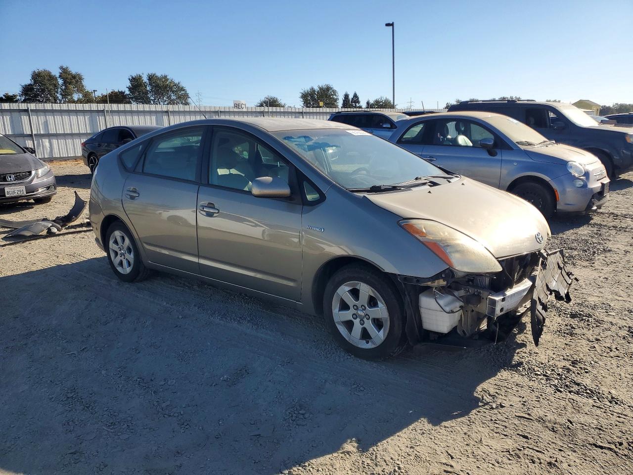 2007 Toyota Prius Base Gold vin: JTDKB20U477610258
