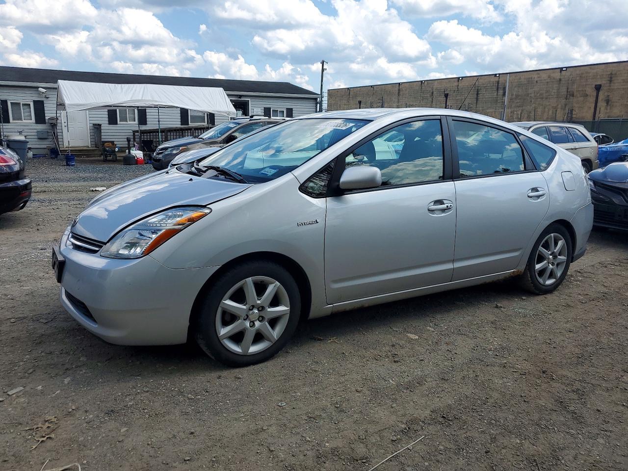 2007 Toyota Prius Base Серебряный vin: JTDKB20U577677970
