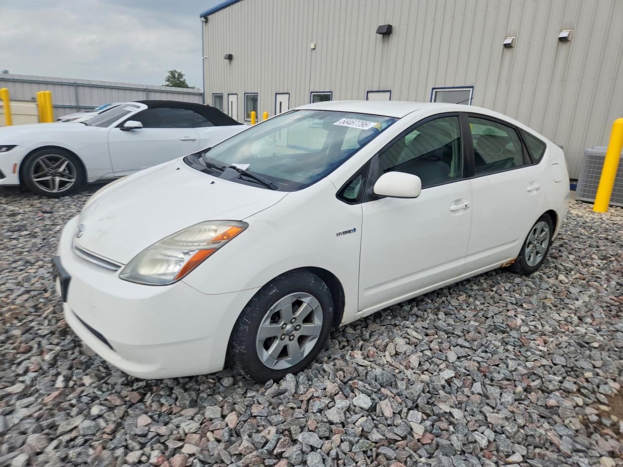 2007 Toyota Prius Base White vin: JTDKB20U577679203