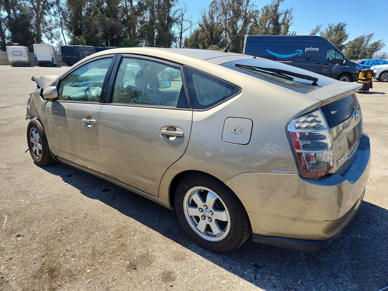 2006 Toyota Prius Base Желто-коричневый vin: JTDKB20U763136036