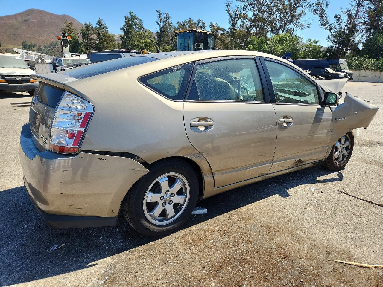 2006 Toyota Prius Base Желто-коричневый vin: JTDKB20U763136036