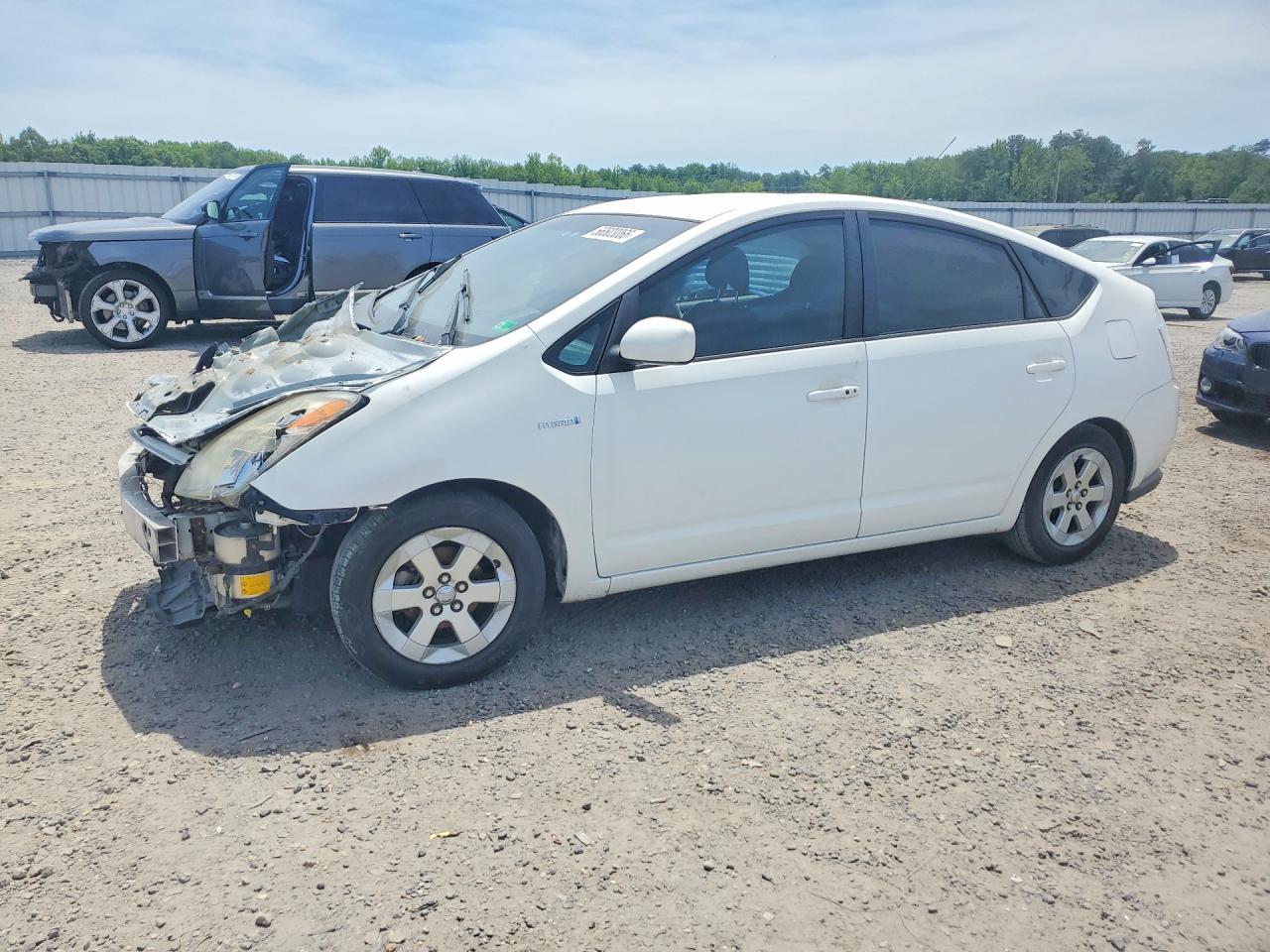 2006 Toyota Prius Base Белый vin: JTDKB20U767507768