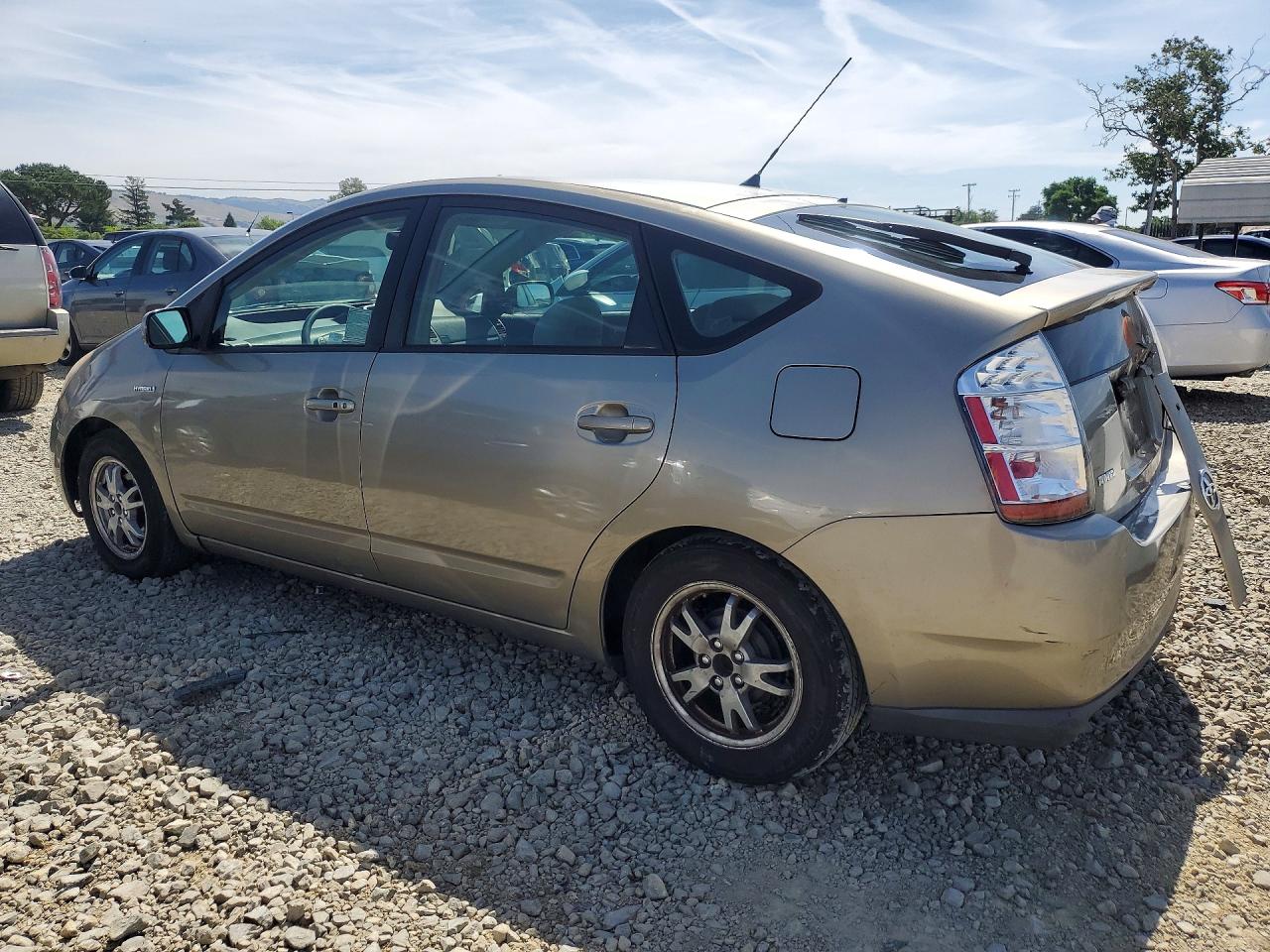 2007 Toyota Prius Base Желто-коричневый vin: JTDKB20U777576588