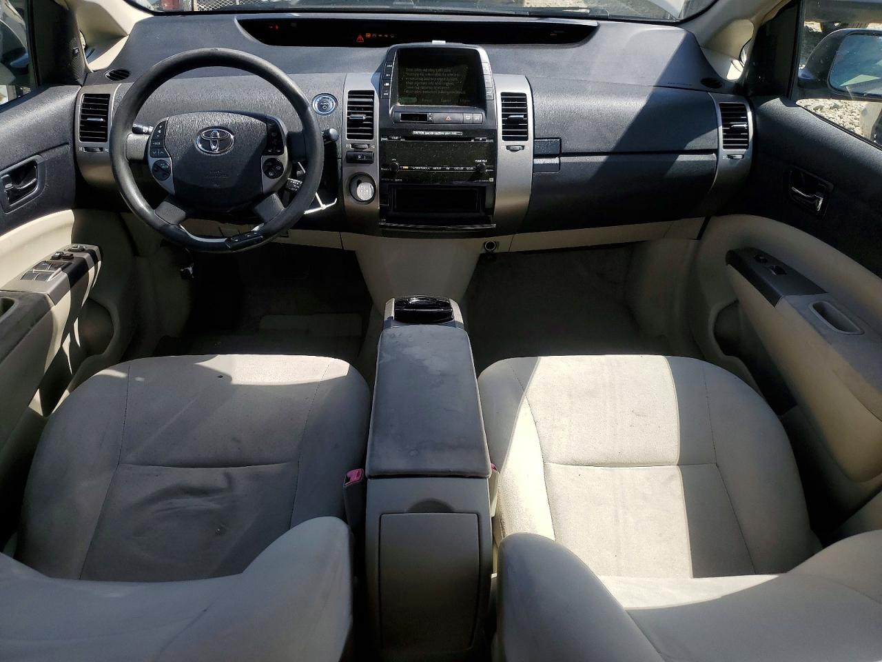 2007 Toyota Prius Base Желто-коричневый vin: JTDKB20U777576588