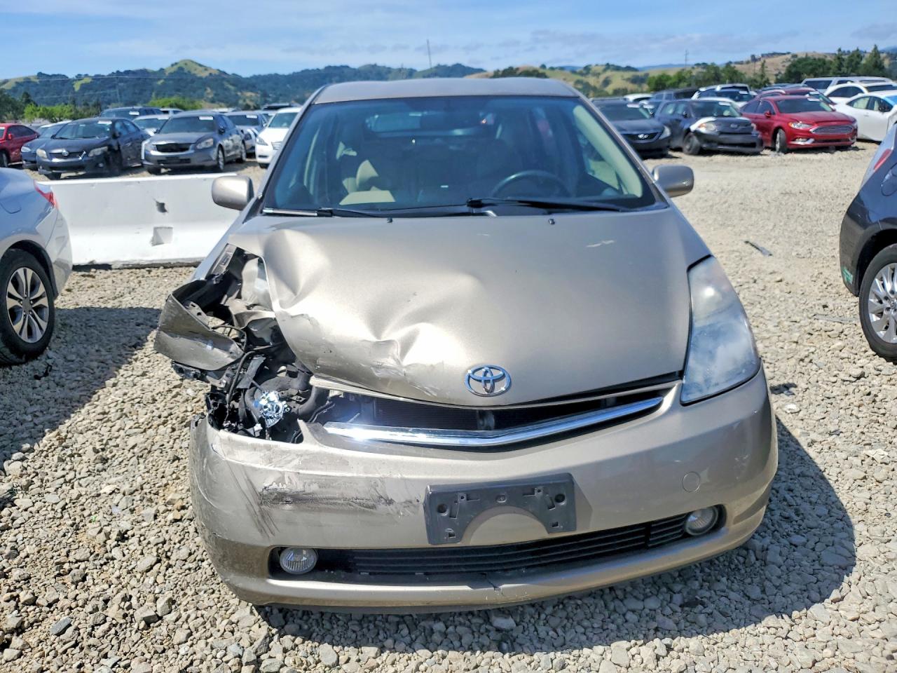 2007 Toyota Prius Base Желто-коричневый vin: JTDKB20U777576588