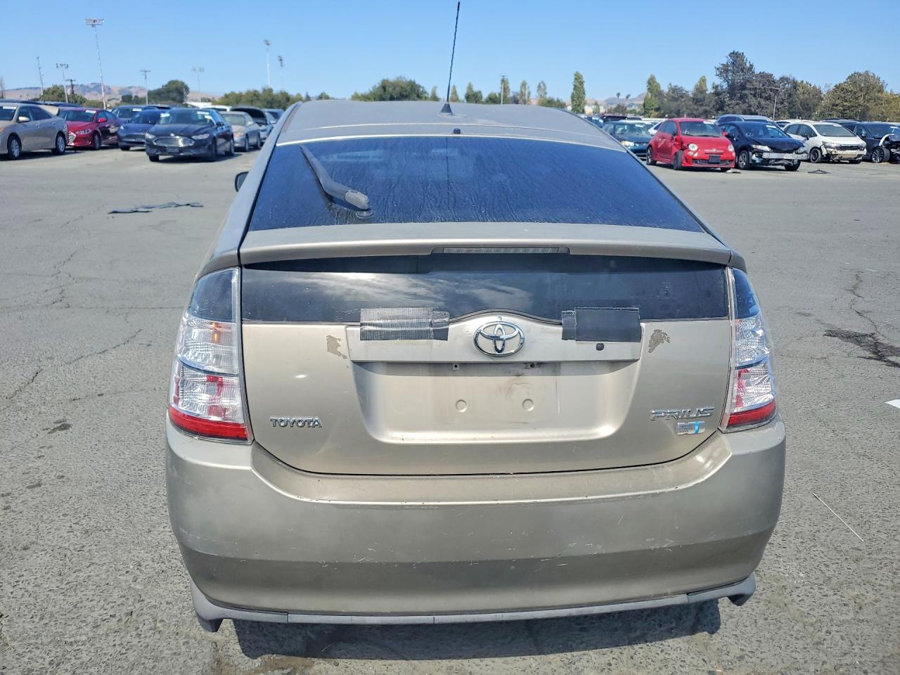 2005 Toyota Prius Base Tan vin: JTDKB20U953058194