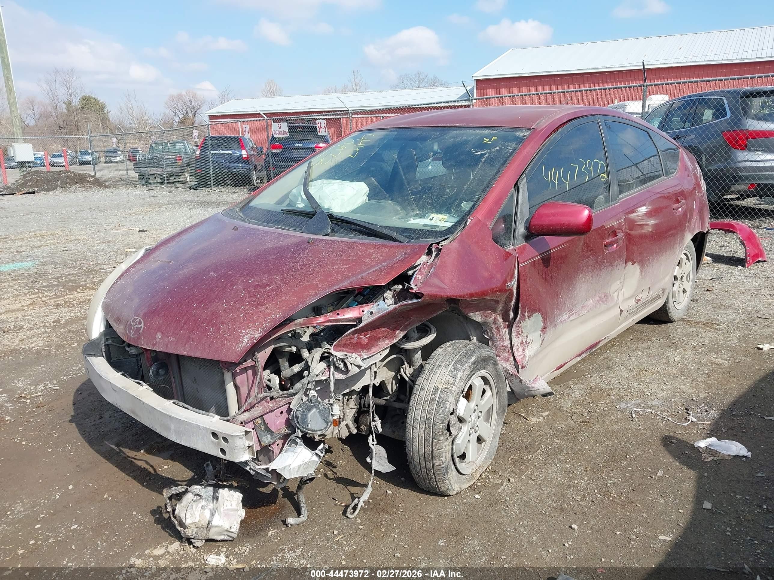 2005 Toyota Prius   Red vin: JTDKB20U953062701