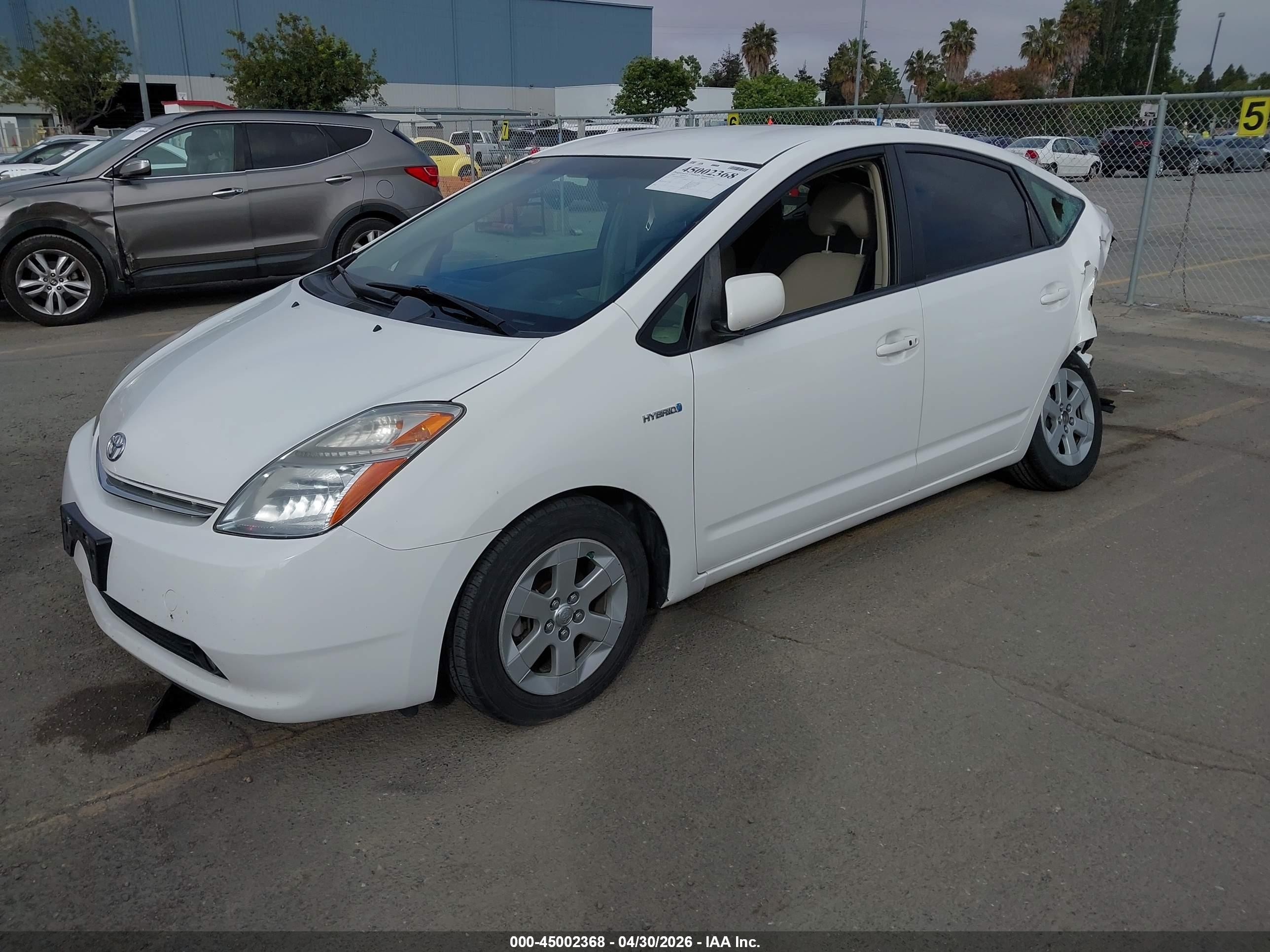 2009 Toyota Prius   White vin: JTDKB20U997839215
