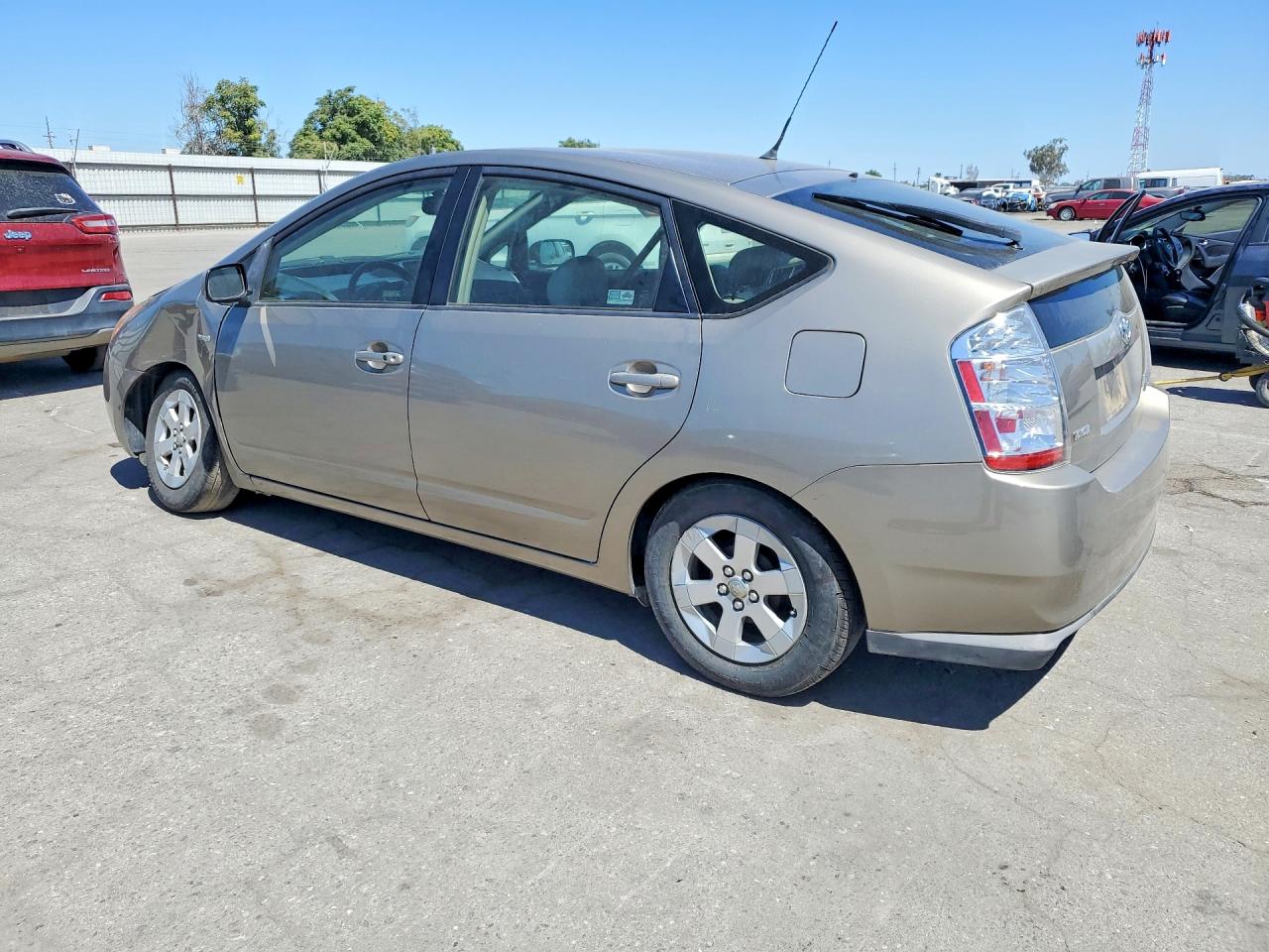 2009 Toyota Prius Base Gold vin: JTDKB20U997870898