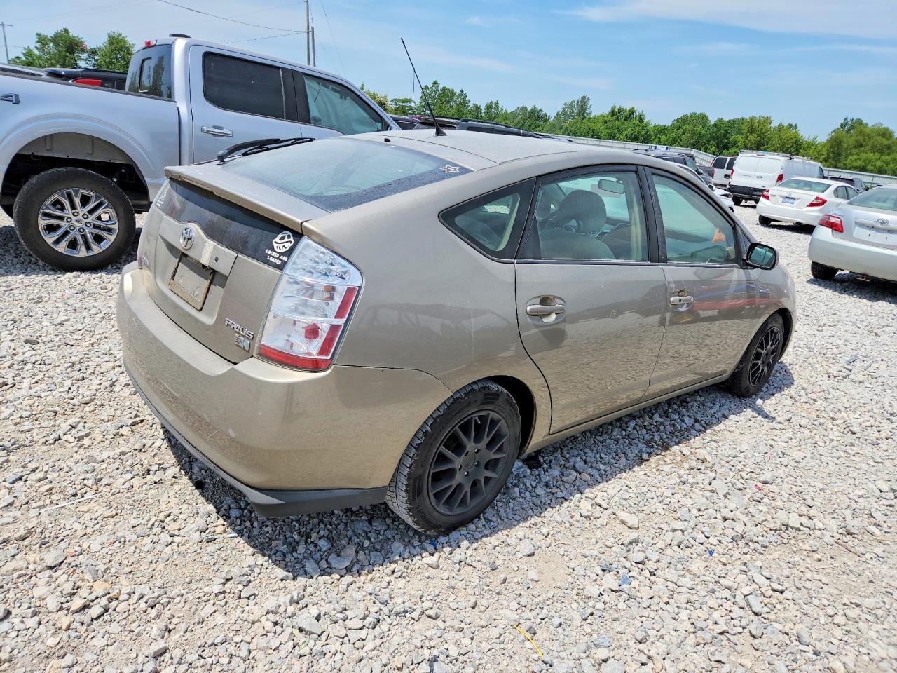 2007 Toyota Prius Base Tan vin: JTDKB20UX77571823