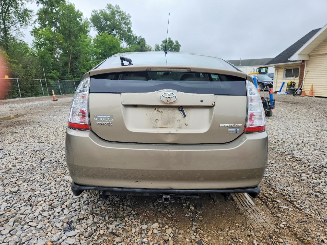 2006 Toyota Prius Base Желто-коричневый vin: JTDKB22U967532569