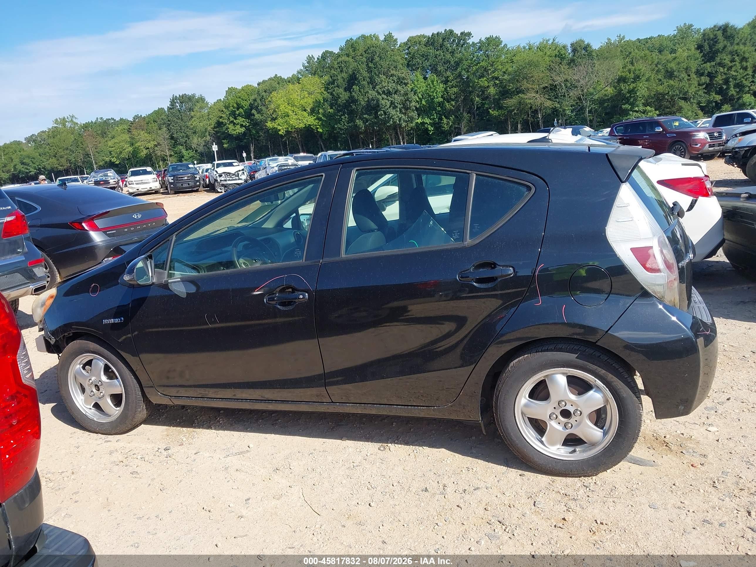 2012 Toyota Prius C Three Черный vin: JTDKDTB30C1005669