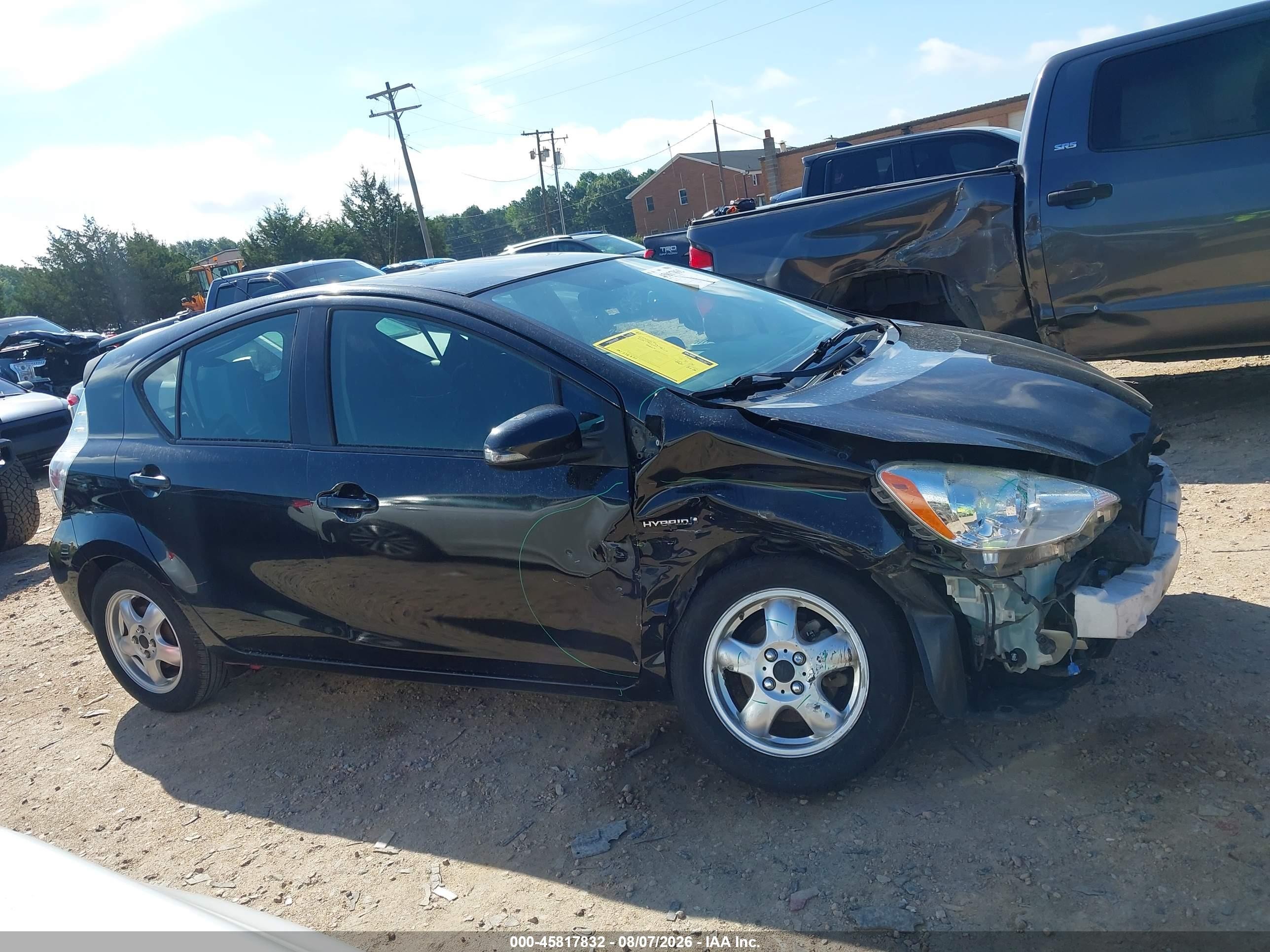 2012 Toyota Prius C Three Черный vin: JTDKDTB30C1005669