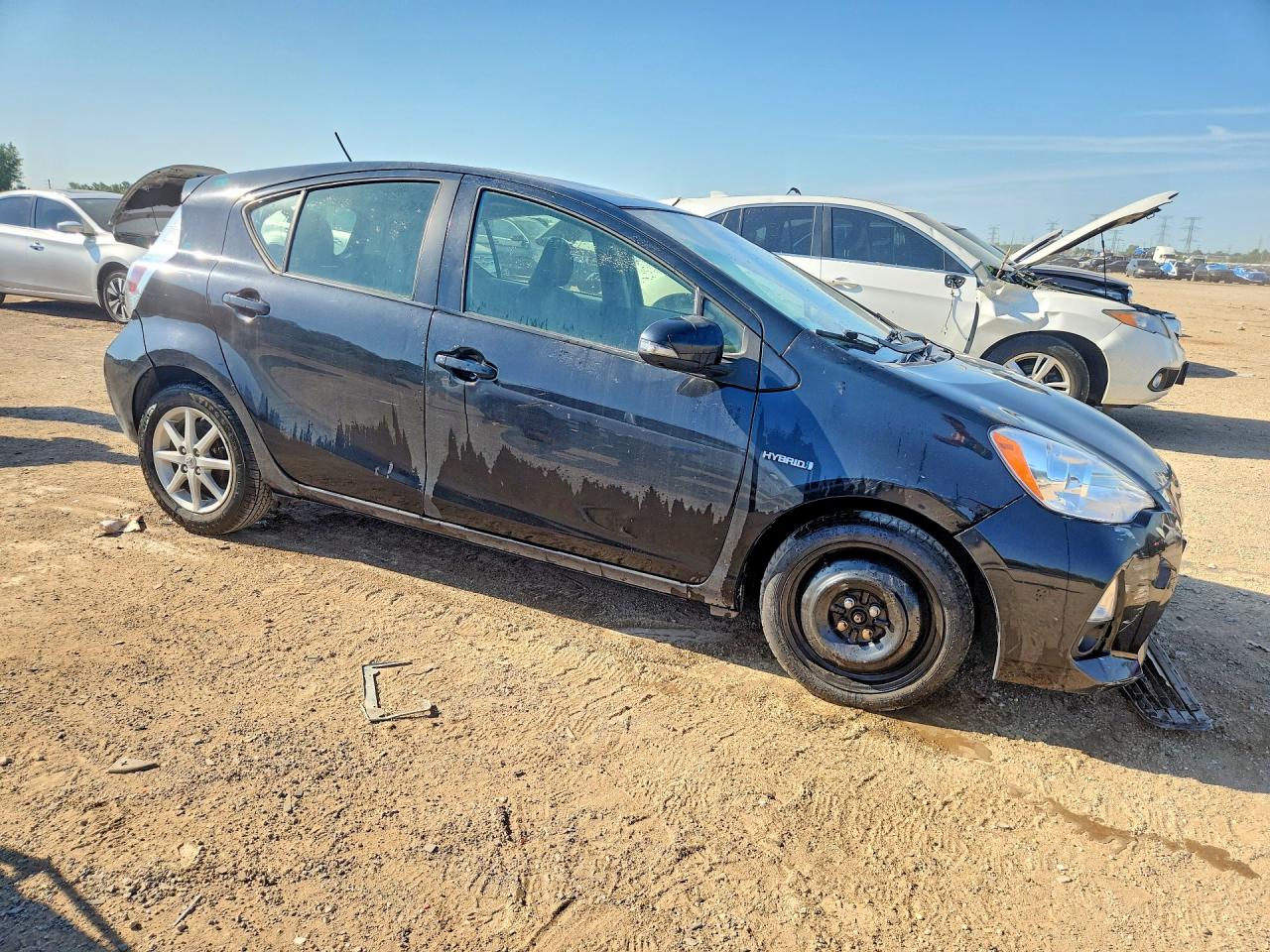 2012 Toyota Prius C Four Black vin: JTDKDTB32C1024952