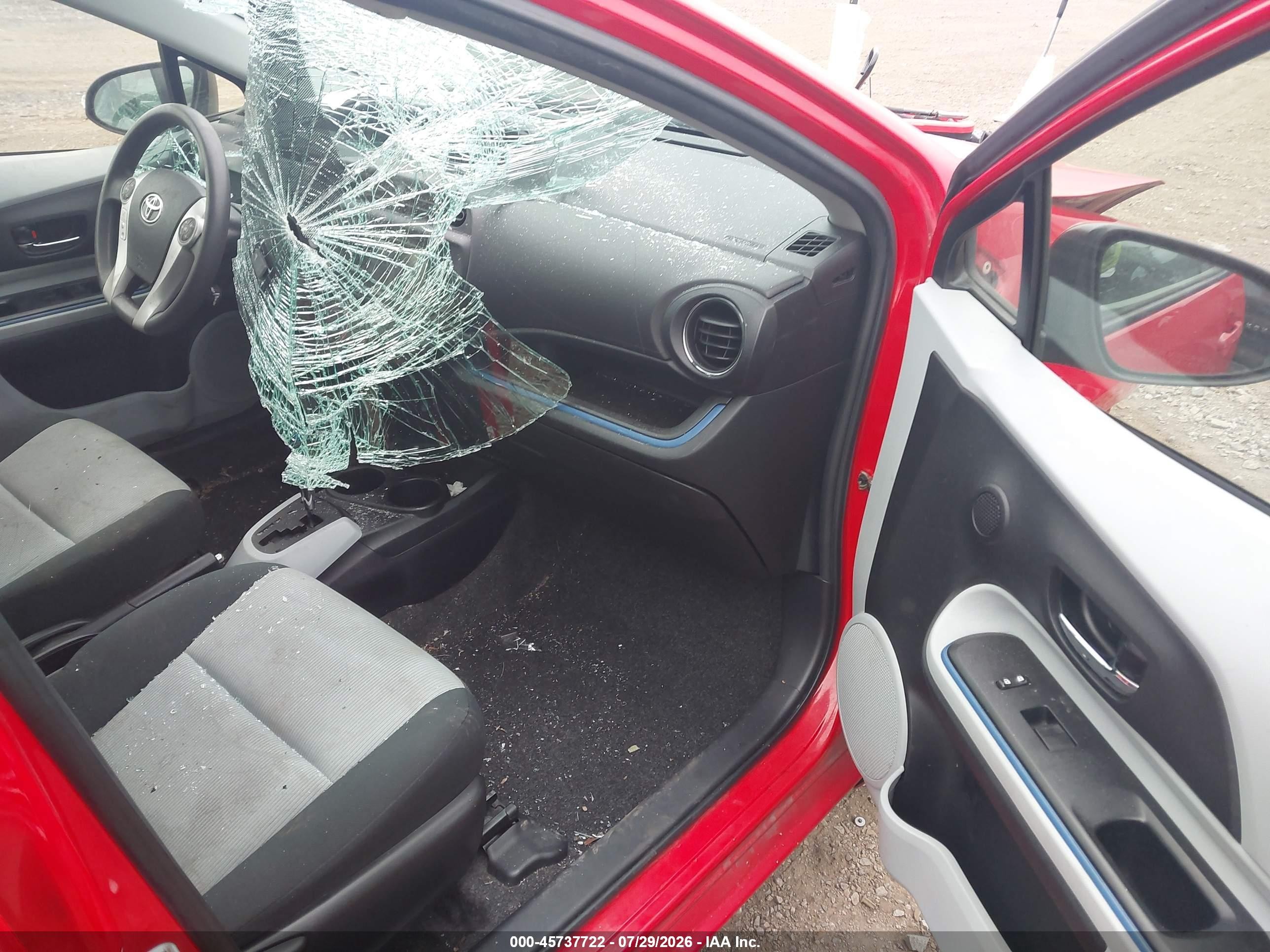 2013 Toyota Prius C Three Red vin: JTDKDTB32D1032227