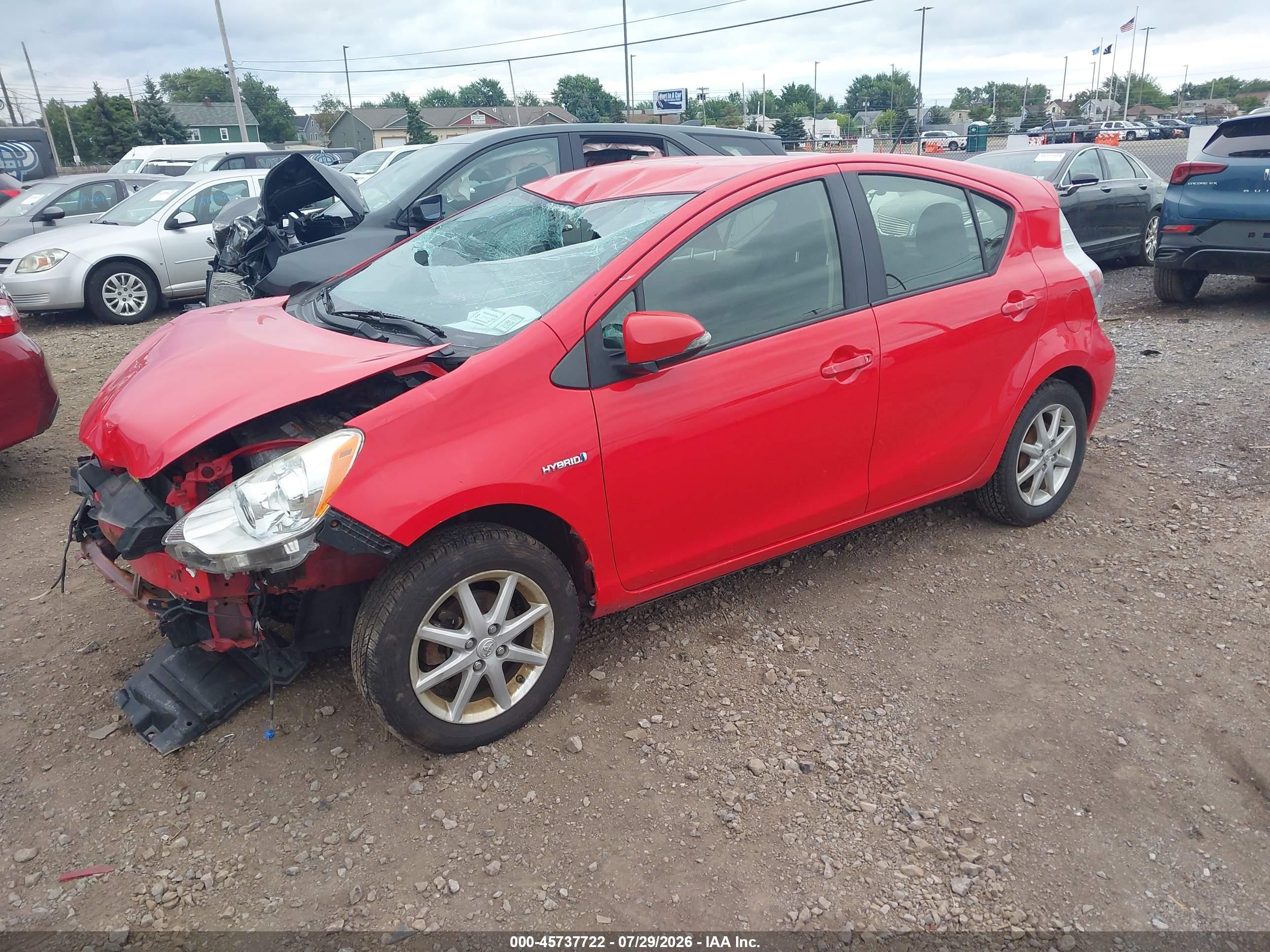 2013 Toyota Prius C Three Red vin: JTDKDTB32D1032227