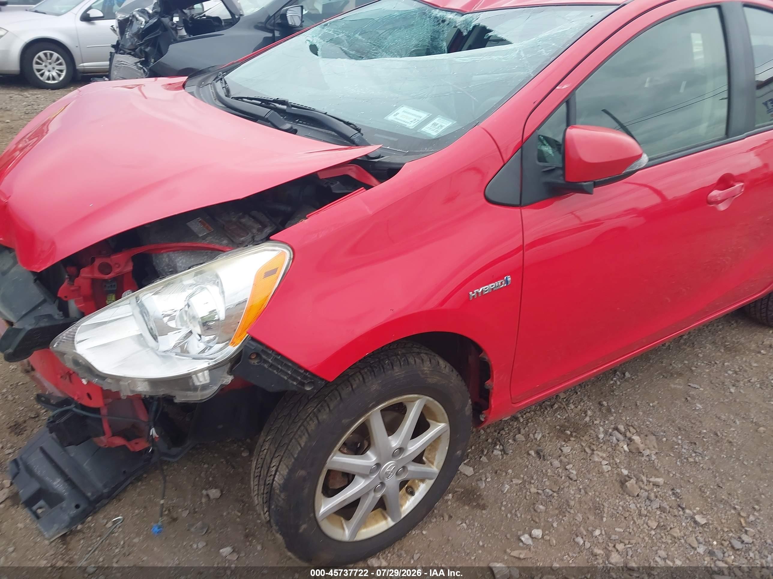 2013 Toyota Prius C Three Red vin: JTDKDTB32D1032227