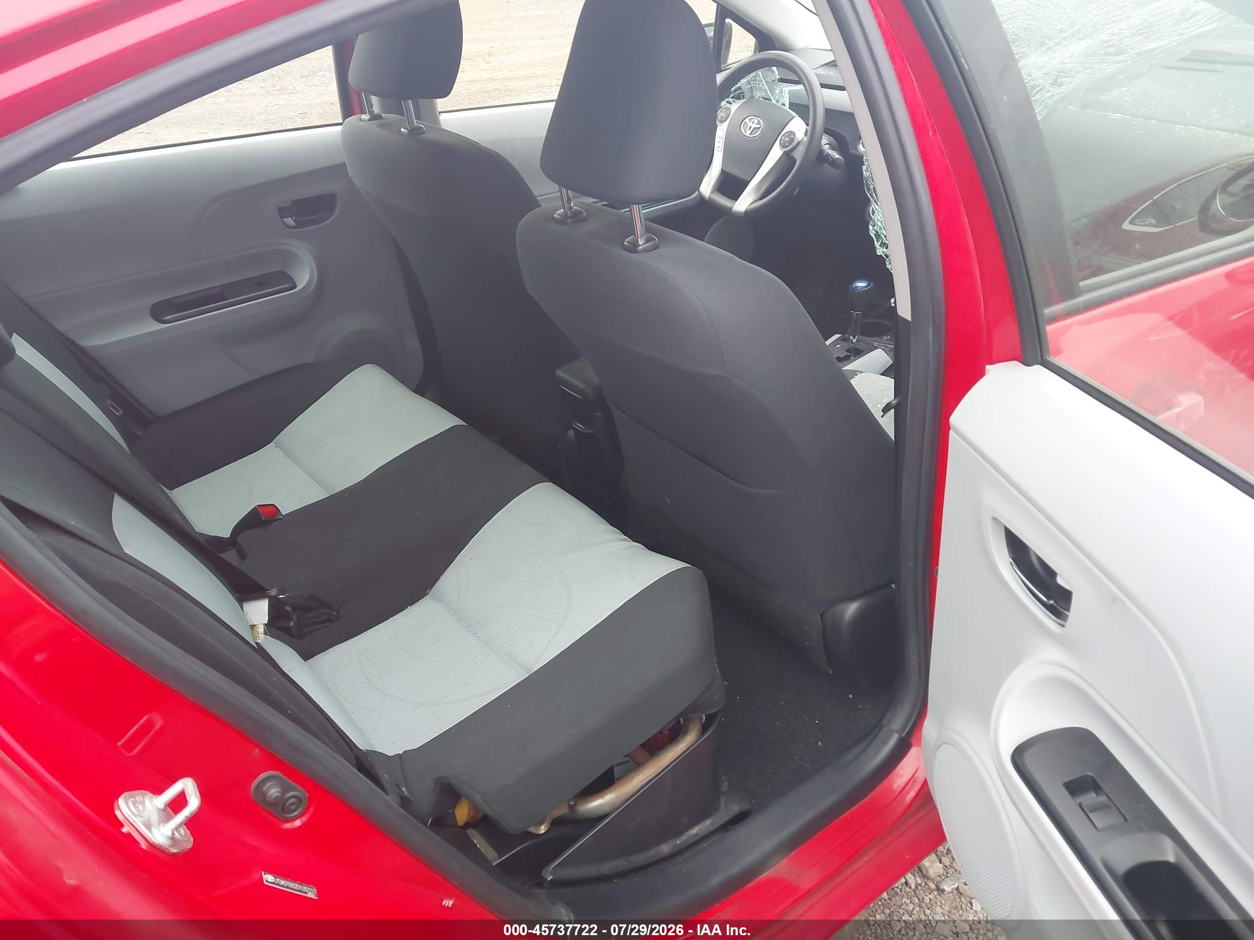 2013 Toyota Prius C Three Red vin: JTDKDTB32D1032227
