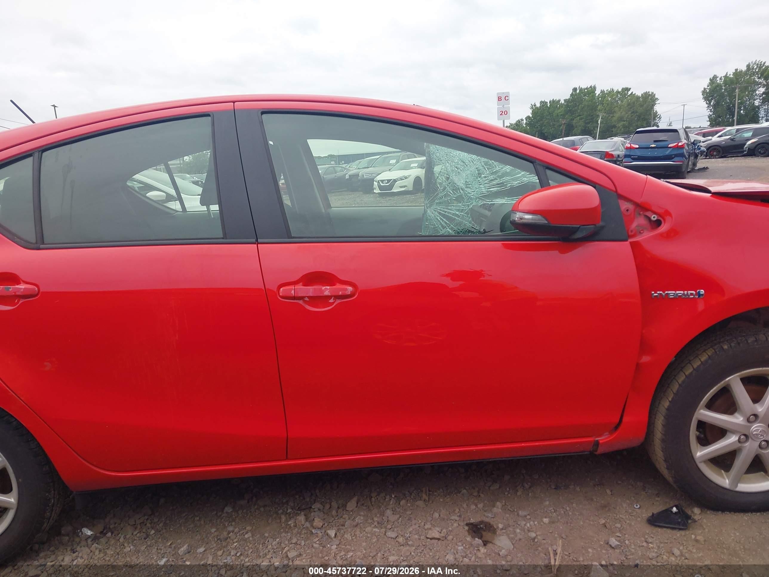 2013 Toyota Prius C Three Red vin: JTDKDTB32D1032227