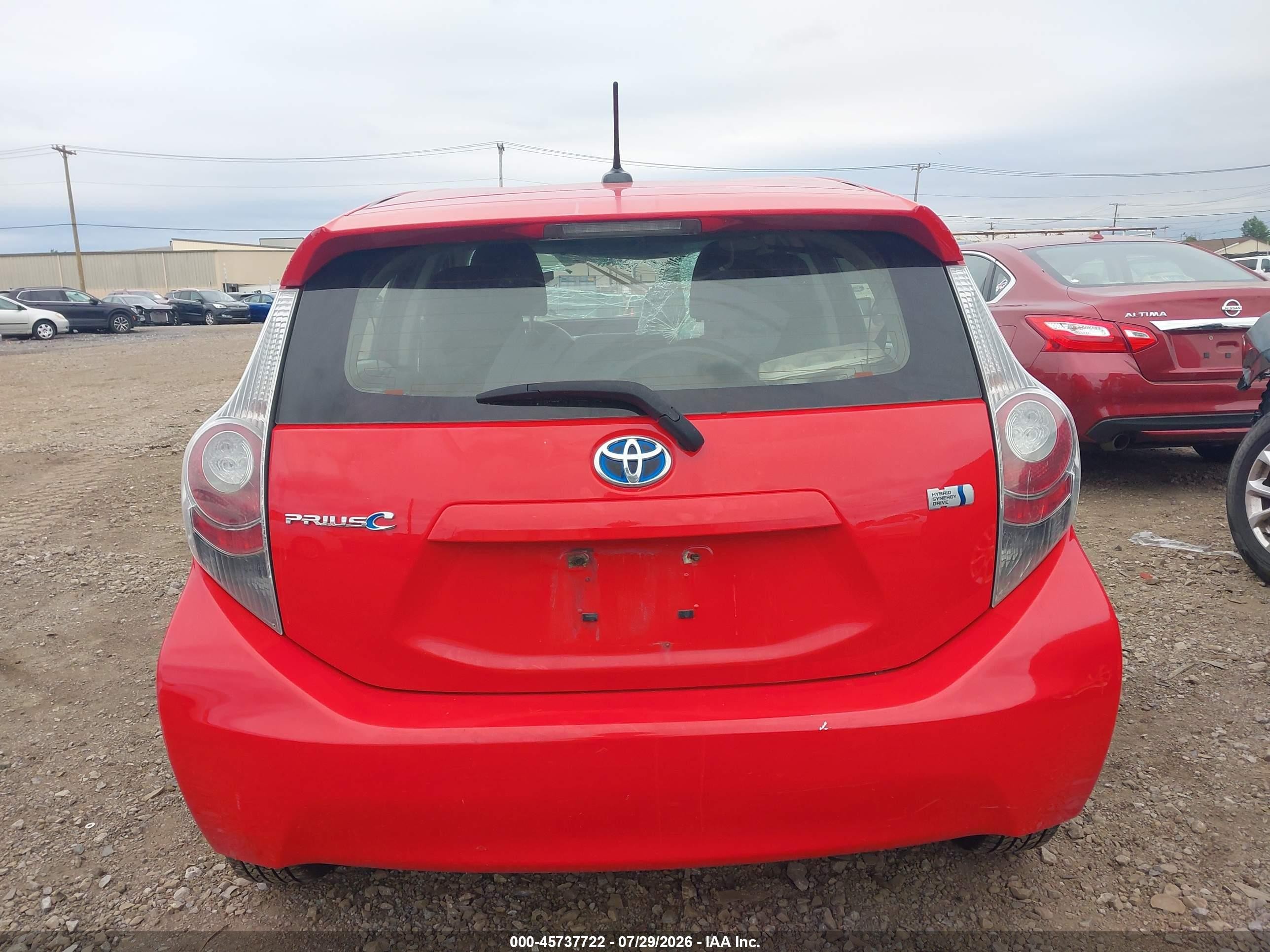 2013 Toyota Prius C Three Red vin: JTDKDTB32D1032227