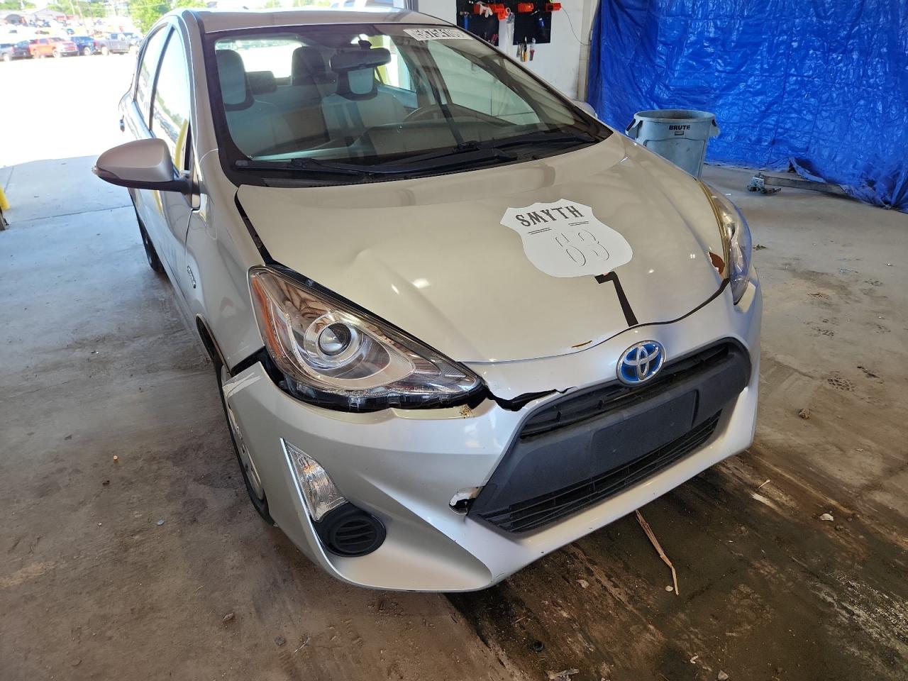 2015 Toyota Prius C One Silver vin: JTDKDTB34F1105357 Damage: Hood, Dent(S) W/ Paint Dmg, > 12 Inches